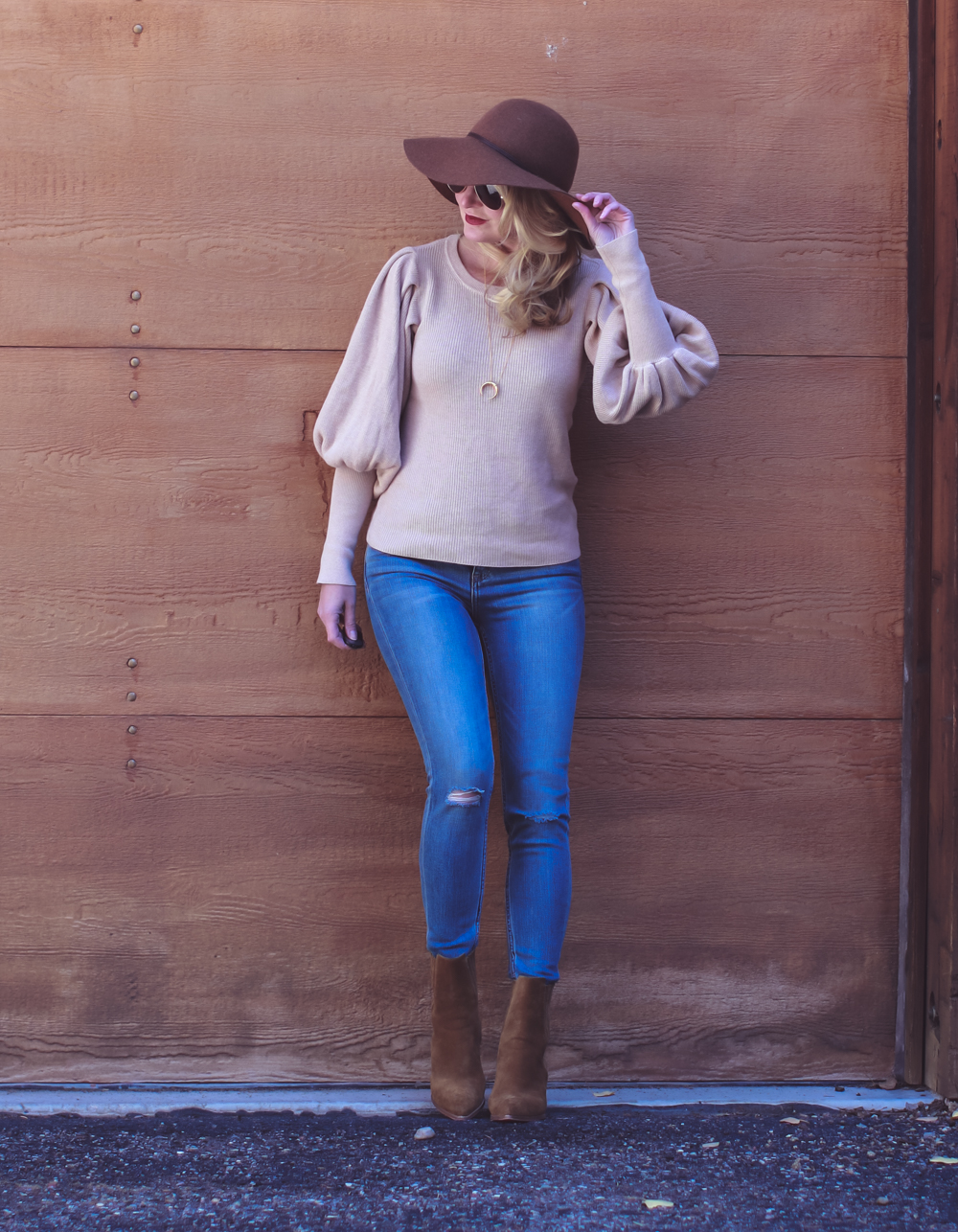 Casual outfit ideas, fall lookbook, with fashion blogger, Erin Busbee featuring vince camuto bubble sleeve sweater and good american cropped jeans and floppy brown hat with marc fisher suede brown booties