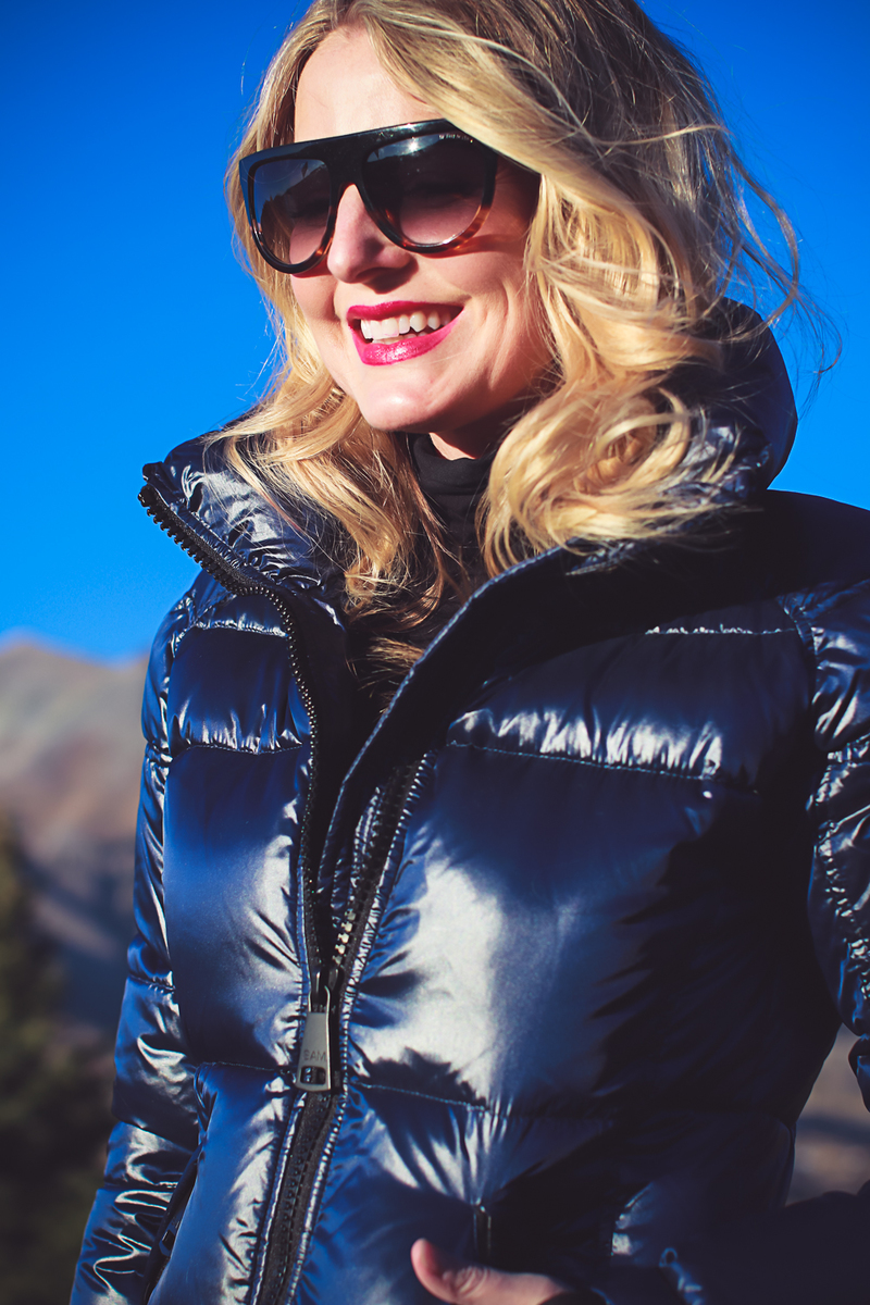 Black turtleneck with SAM. puffer jacket from Bloomingdales and Stuart Weitzman Lowland Boots on fashion blogger, Erin Busbee, Busbee Style in Telluride, Colorado