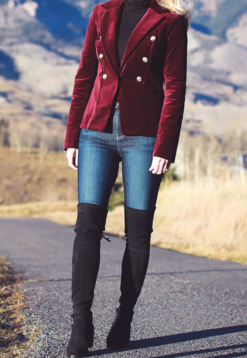 Black turtleneck by Eileen Fisher, with Velvet burgundy blazer from Bloomingdales, Rag & Bone dark wash skinny jeans with Stuart Weitzman Lowland Boots on Fashion Blogger Erin Busbee of Busbee Style in the mountains of Telluride Colorado
