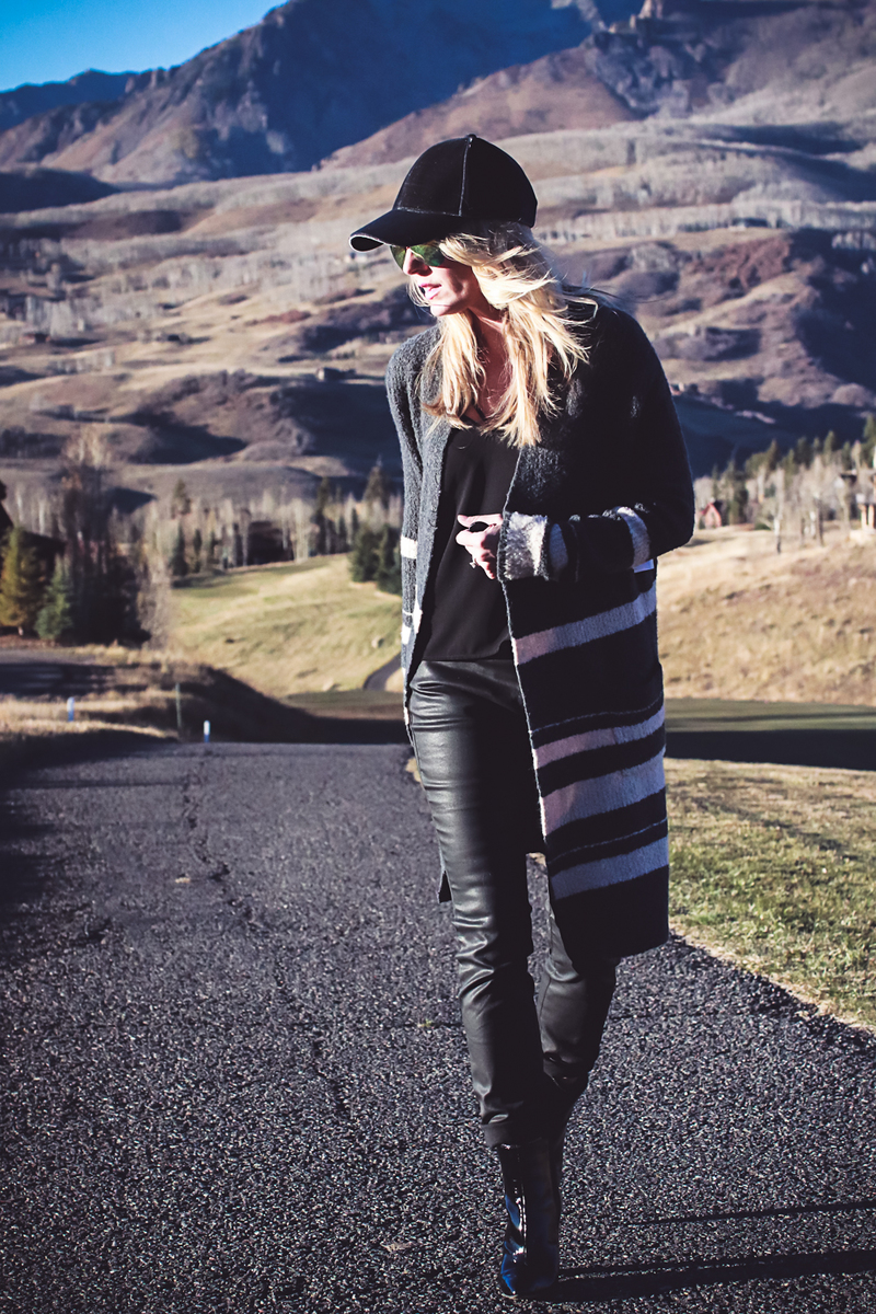 Faux Leather Pants by Eileen Fisher with long striped cardigan sweater, and moto waterproof boots from Bloomingdales Styled 3 Ways by Fashion Blogger Erin Busbee