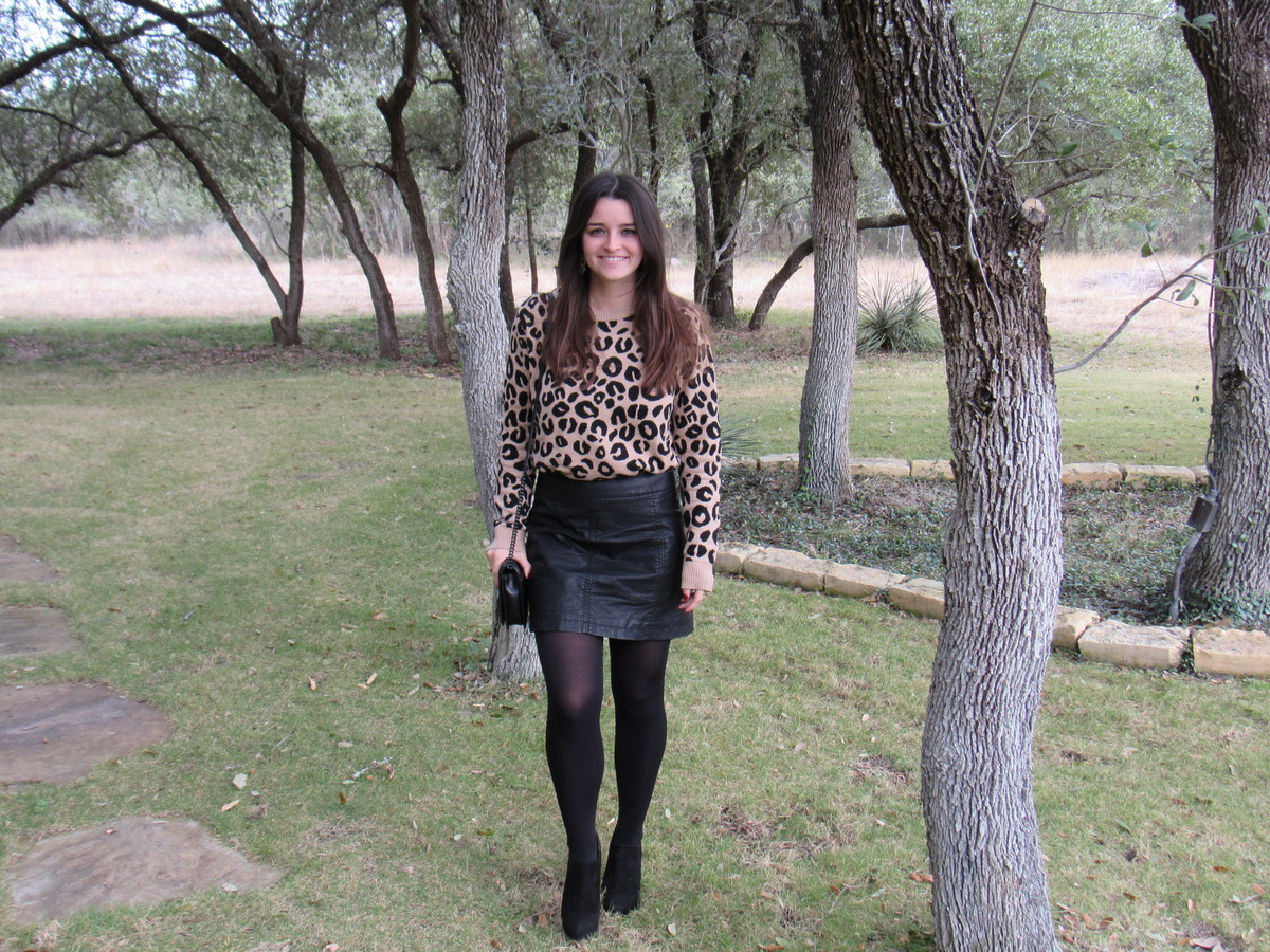 Cheetah sweater from target with black skirt and booties