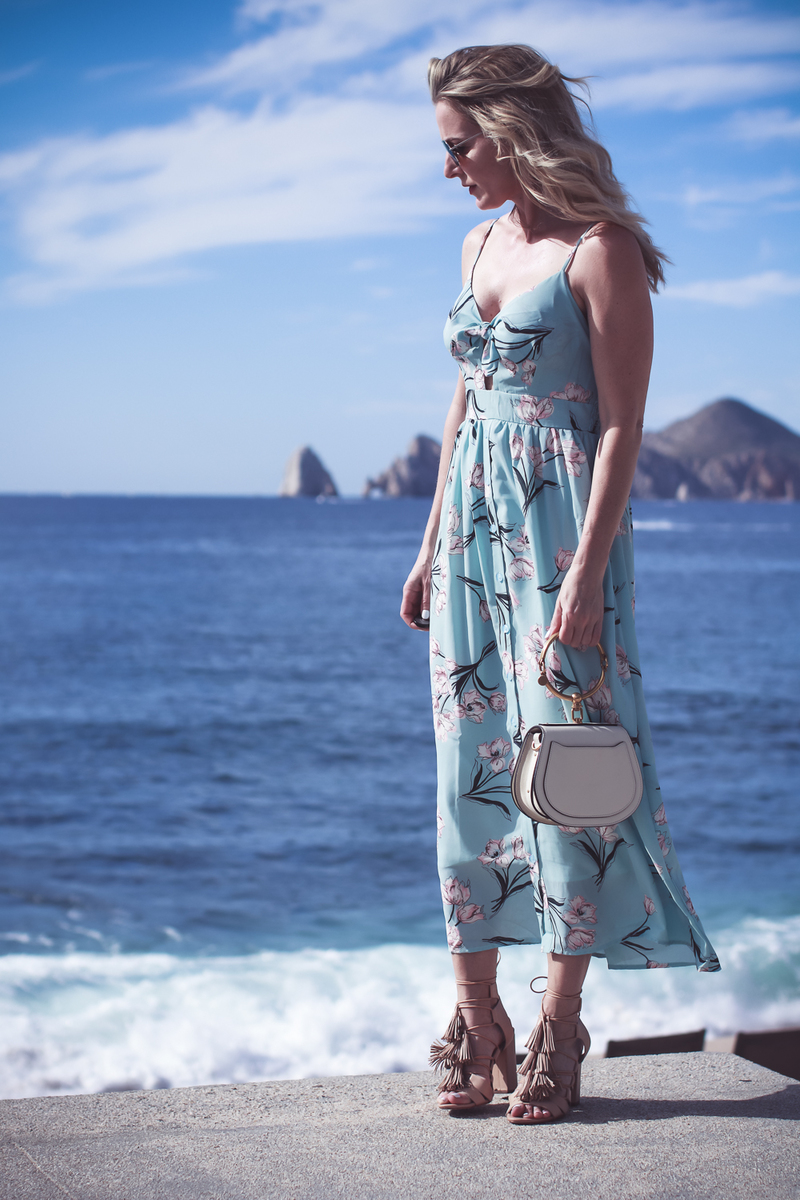 Beach shoes, on fashion blogger Erin Busbee of Busbee Style, Fashion over 40, wearing a floral print maxi dress in mint green, wearing Loeffler Randall laceup tassel sandals in nude in Cabo San Lucas