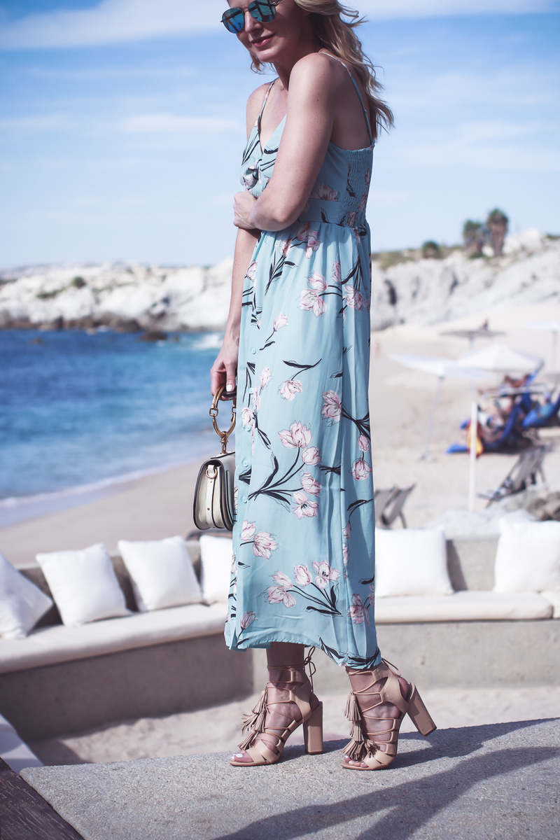 Beach shoes, on fashion blogger Erin Busbee of Busbee Style, Fashion over 40, wearing a floral print maxi dress in mint green, wearing Loeffler Randall laceup tassel sandals in nude in Cabo San Lucas