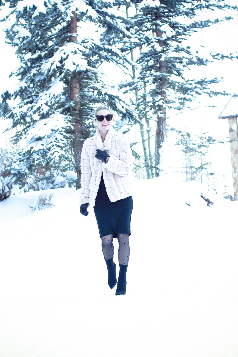 essential winter boots, featuring a dressy sock ankle bootie in black by Stuart Weitzman paired with a T by Alexander Wang laceup dress, and a faux fur coat by Kristin Blake on fashion blogger over 40, Erin Busbee of Busbee Style