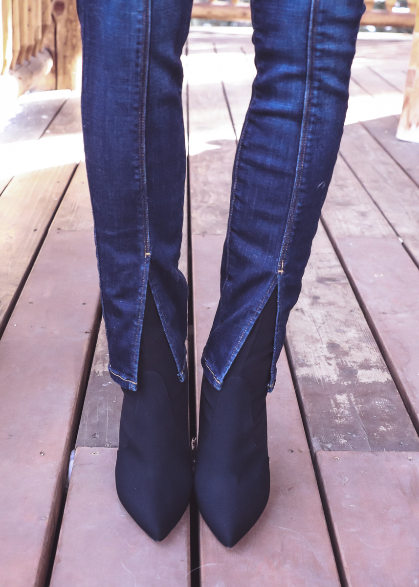Wearing Boots with Jeans | Black sock boots with split hem jeans