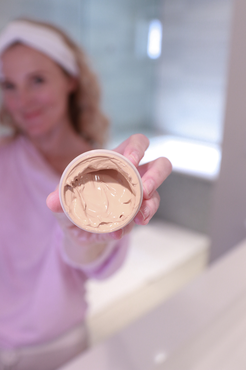 Perfect make-up steps for photo shoots, videos and Zoom calls Erin holding jar of foundation