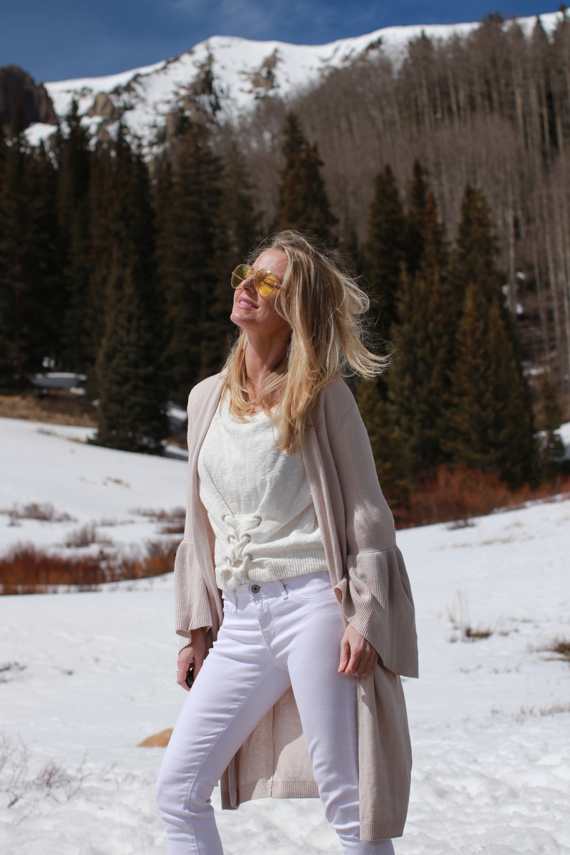 Erin Busbee of Busbee Style wearing a flared sleeve cardigan as a light layer for spring