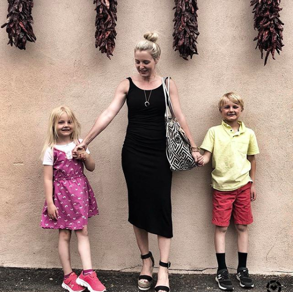 blonde woman with hair in top knot bun wearing a black ruched tank dress from Nordstrom in Santa Fe holding hand with her two children, Instagram roundup