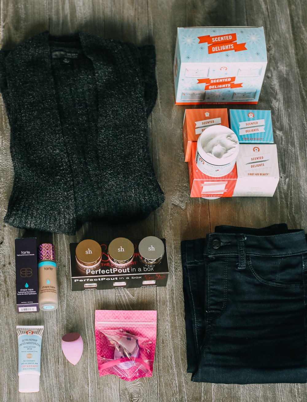 Feel Nice box from QVC review by fashion blogger over 40, Erin Busbee of busbeestyle.com featuring First Aid tinted moisturizer, tarte shape tape, barefoot dreams cardigan, feel good jeans