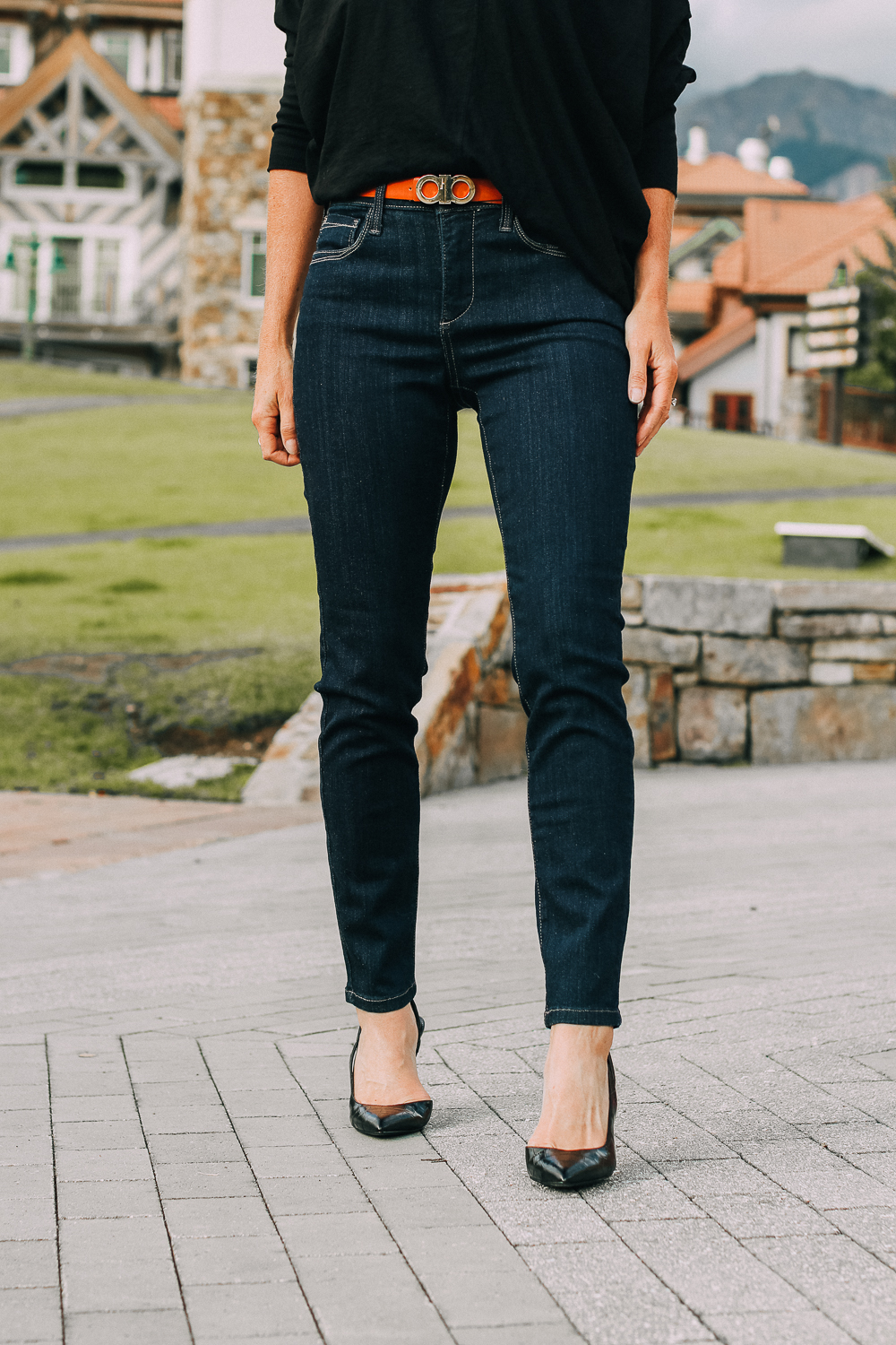 Best Jeans for Curves by Not Your Daughter's Jeans or NYDJ paired with black of shoulder dolman top, Quay aviator sunglasses, gold earrings on fashion blogger over 40, Erin Busbee of busbee style