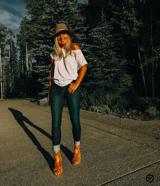 blonde woman wearing white express tee and rag and bone jeans with a rag and bone hat and marc fisher booties, what i wore