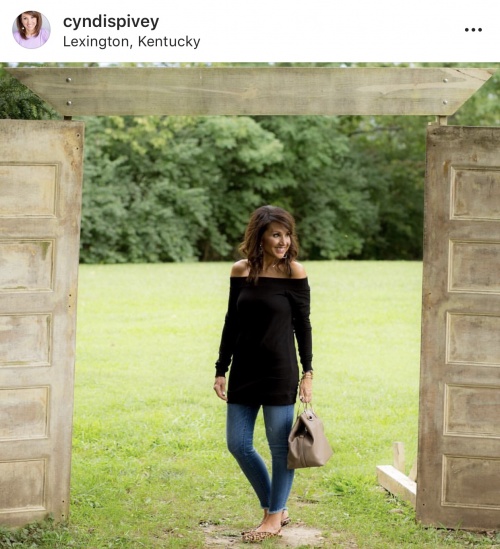 Skinny Jeans Over 40, 40+ Style Blogger Cyndispivey Wears Skinny Denim Jeans with an off the shoulder black top 