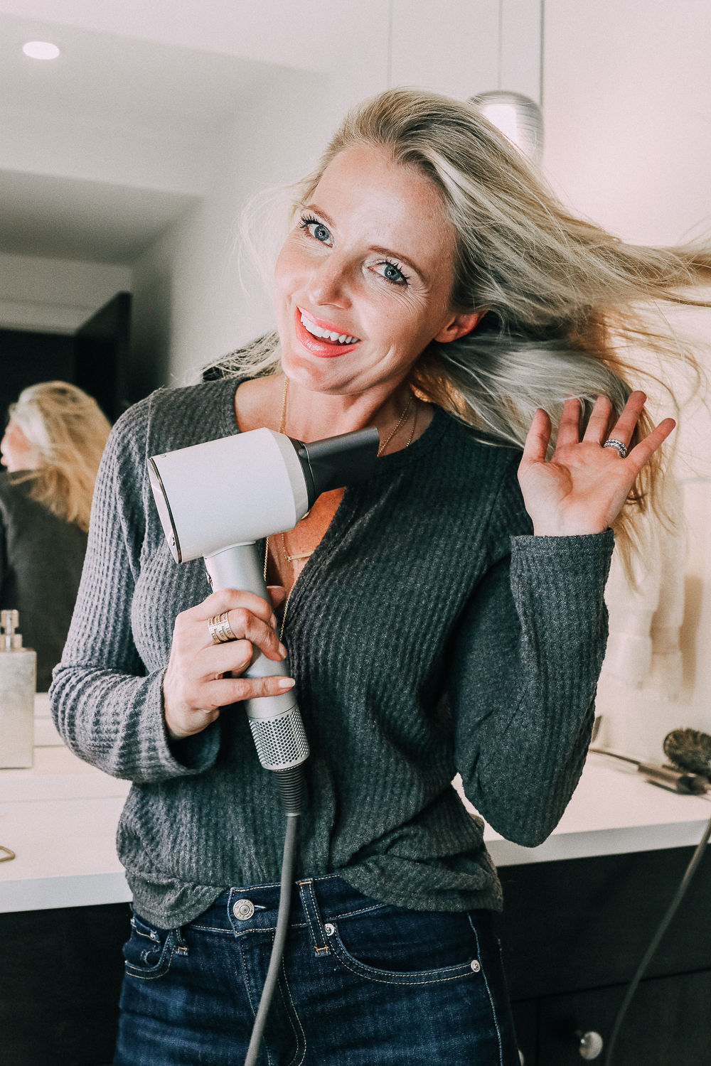 Best Selling Gifts QVC featuring the Dyson hair dryer in white and silver