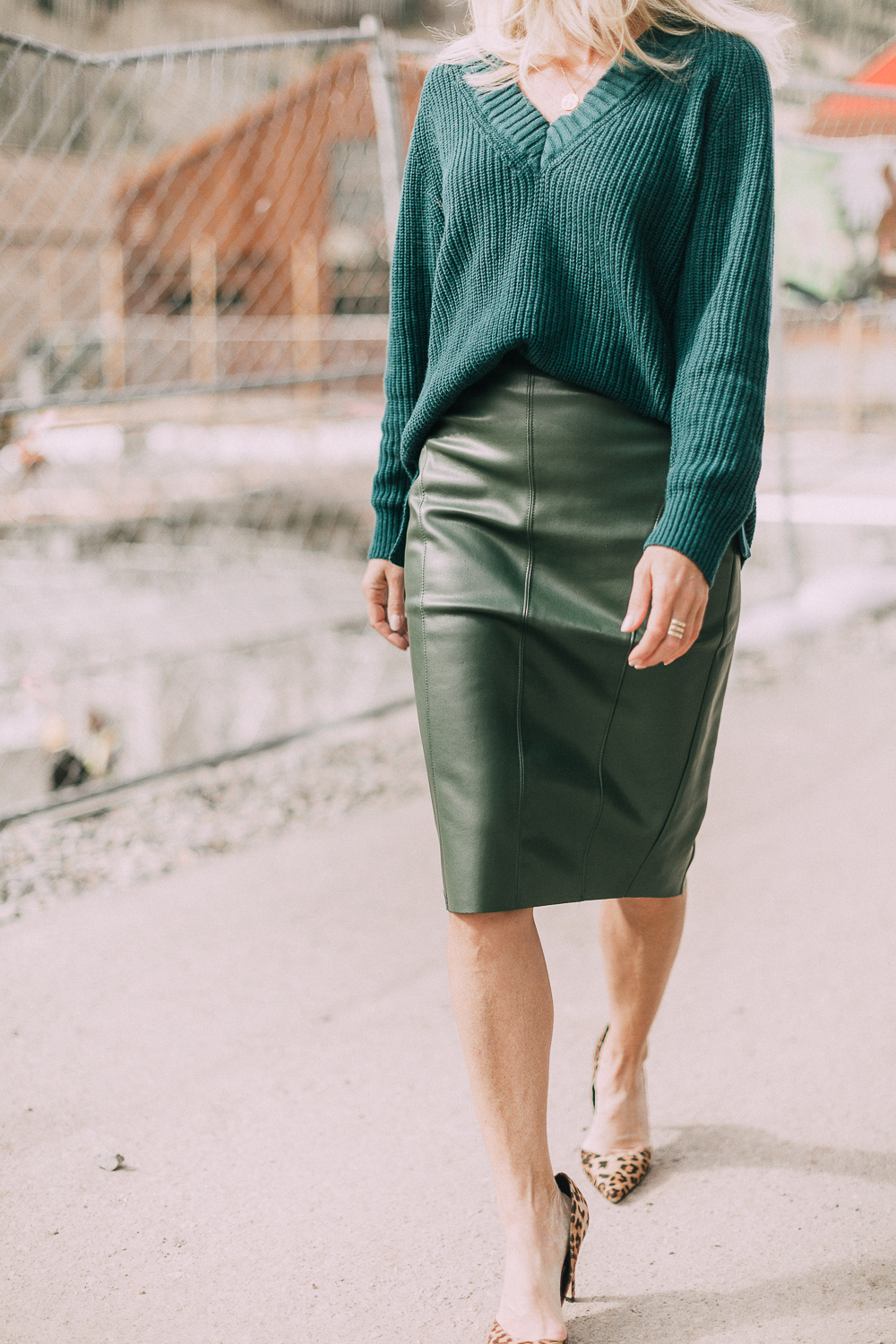 fall holiday workwear outfit business casual green leather skirt green sweater office attire