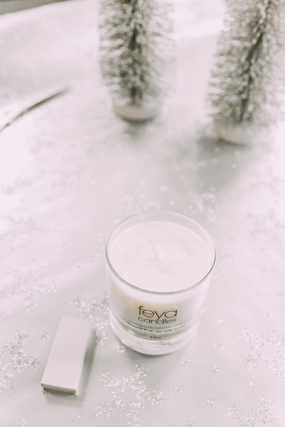 holiday gift ideas from JCPenney featuring a Feya holiday cheer boxed soy candle