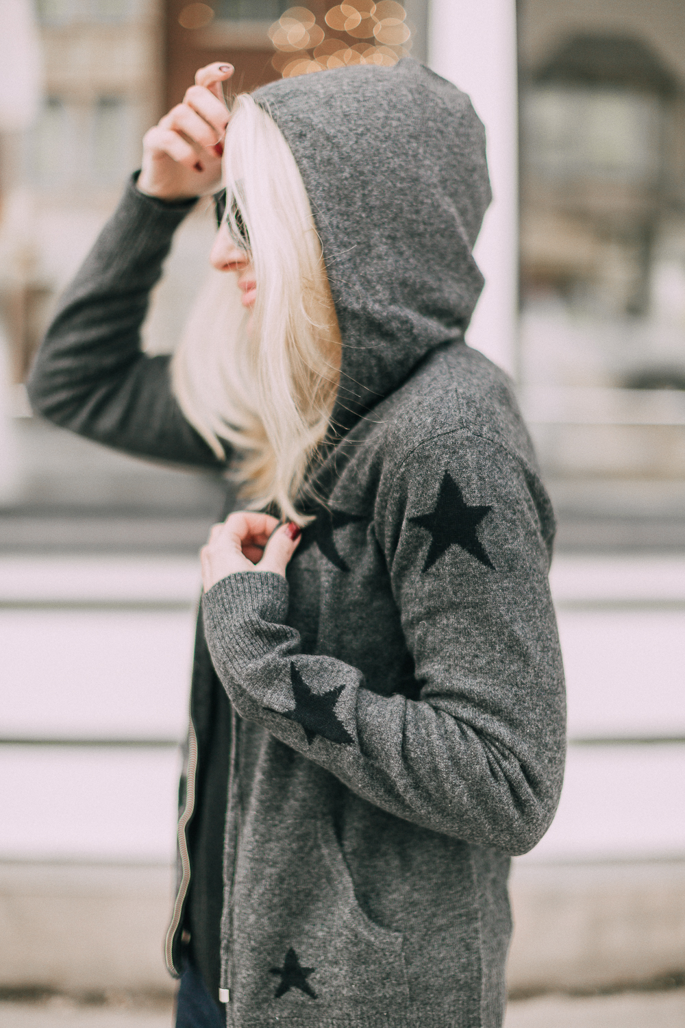 wardrobe staples your closet needs including a black cashmere crewneck sweater and high rise dark wash skinny jeans both from Walmart paired with a cashmere star hoodie and scrunch sneaker boots