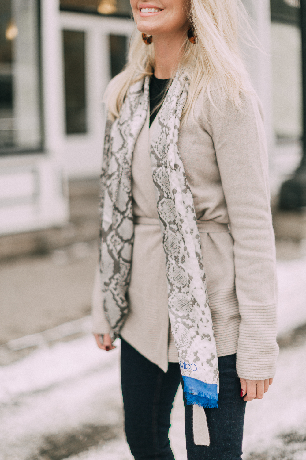 wardrobe staples your closet needs including a black cashmere crewneck sweater and high rise dark wash skinny jeans both from Walmart paired with a cashmere cardigan and python scarf by Calvin Klein