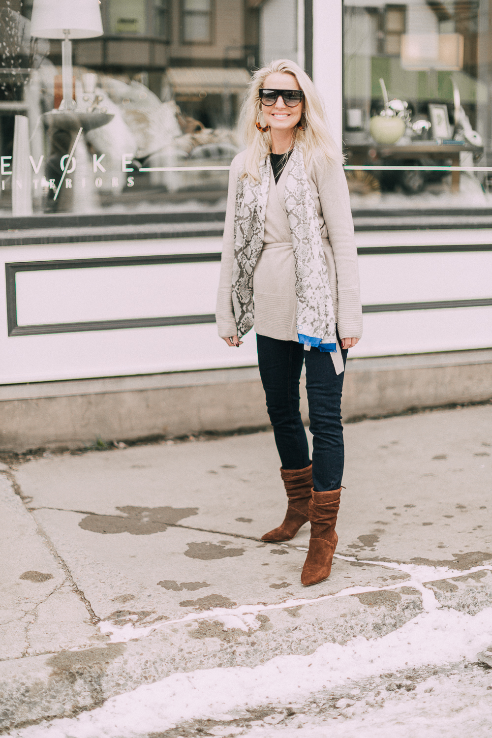 wardrobe staples your closet needs including a black cashmere crewneck sweater and high rise dark wash skinny jeans both from Walmart paired with a cashmere cardigan and python scarf by Calvin Klein