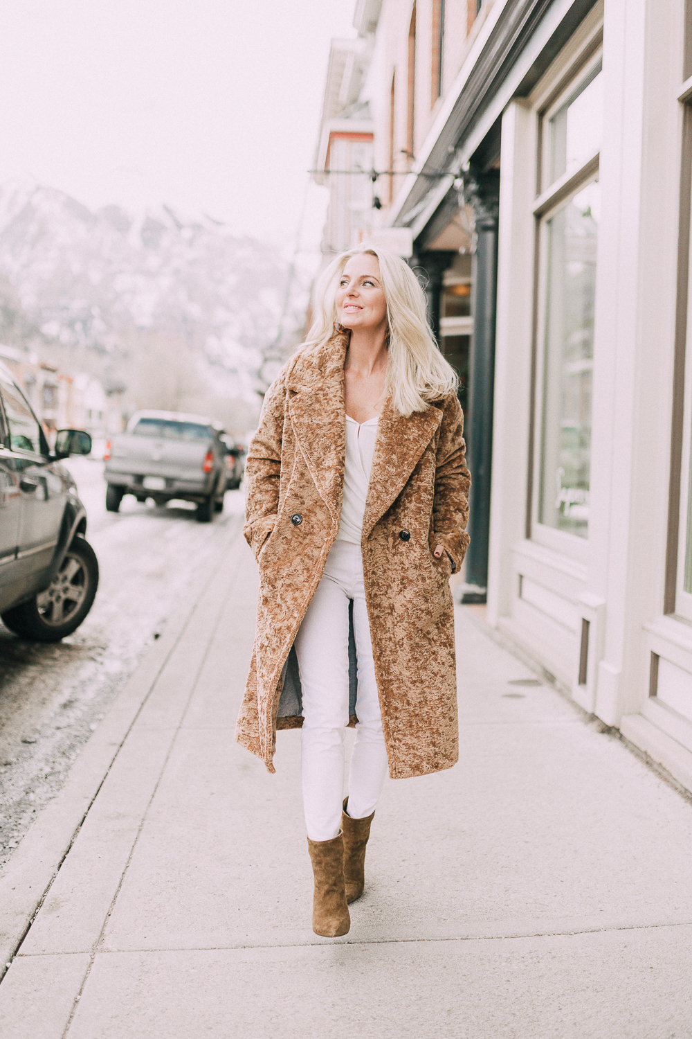 ave les filles fuzzy jacket with an all white outfit on fashion blogger busbee style