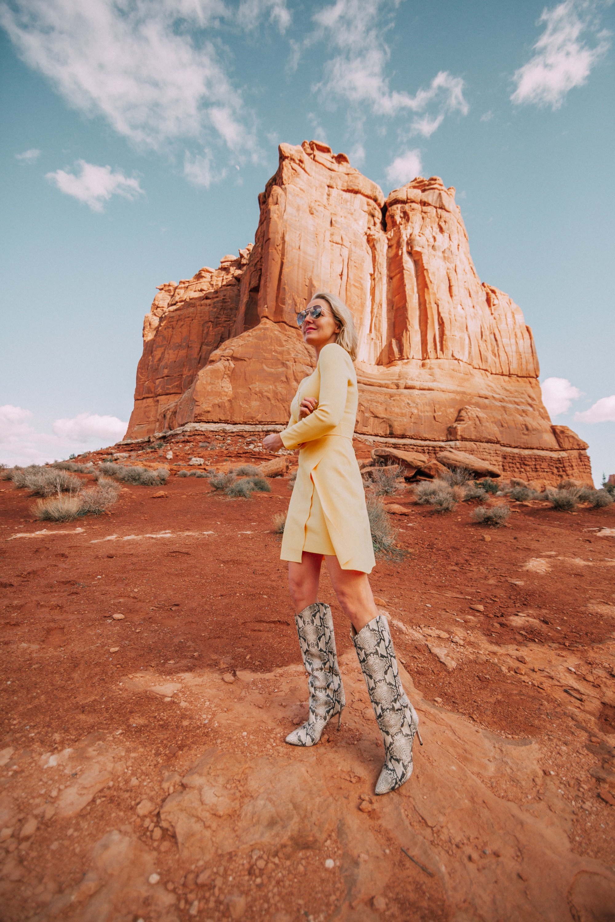 Spring Fashion Trends 2019 featuring neon yellow ALC dress with Schutz python western boots on fashion blogger Erin Busbee