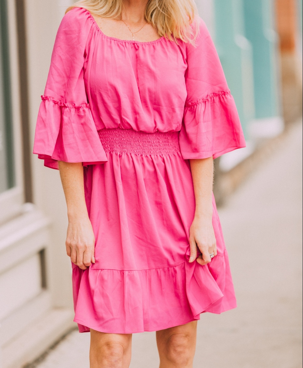 Spring fashion, fashion blogger erin busbee of busbeestyle.com wearing a pink Le Gali off the shoulder dress with Via Spiga white mules from Bloomingdale's in Telluride, CO