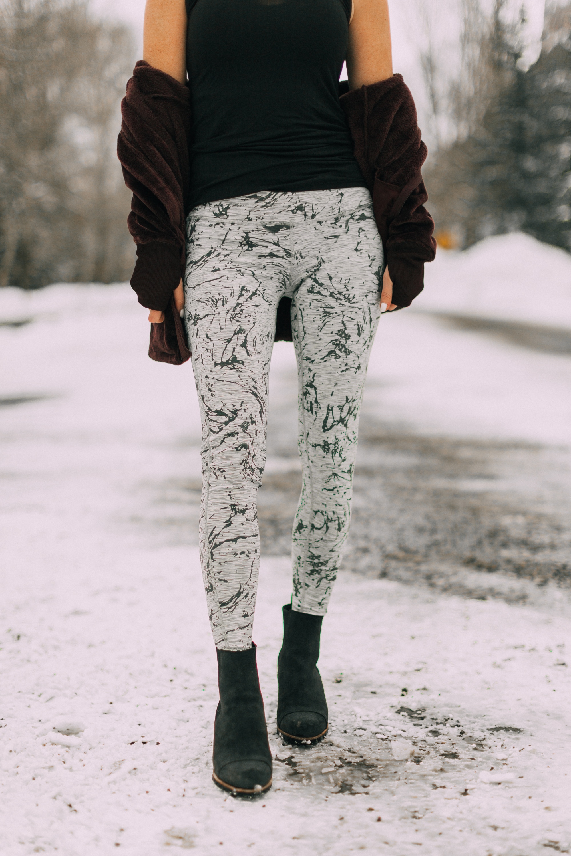 Affordable Reversible Legging, featuring reversible marble printed leggings, breathable tank, and fleece jacket from Jockey worn by fashion blogger over 40, Erin Busbee of BusbeeStyle.com in Telluride, CO