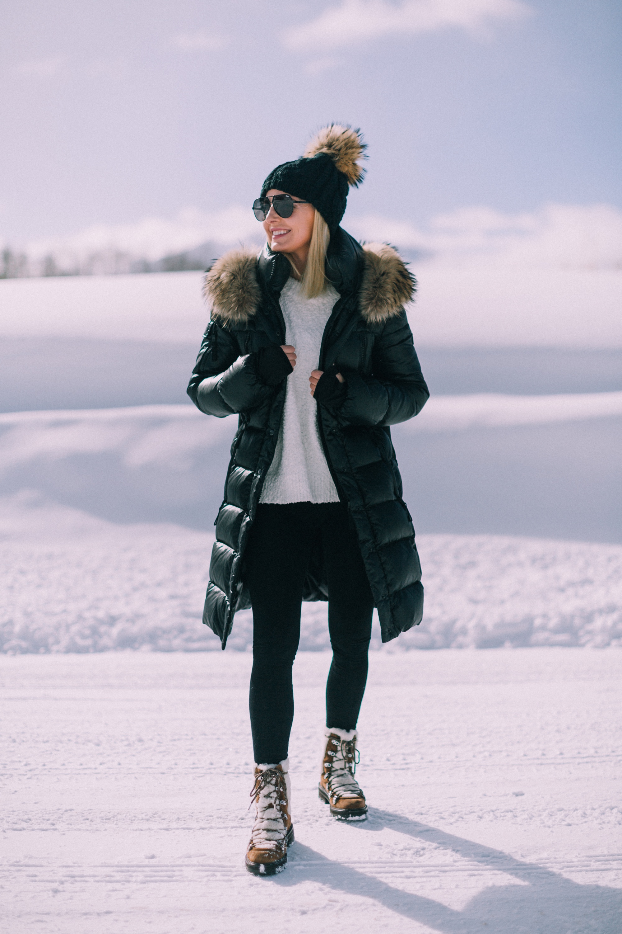 fashion blogger over 40 years old showing how to wear Spanx leggings with SAM puffer coat Sanctuary sweater sigerson morrison isla fur boots in Telluride Colorado 