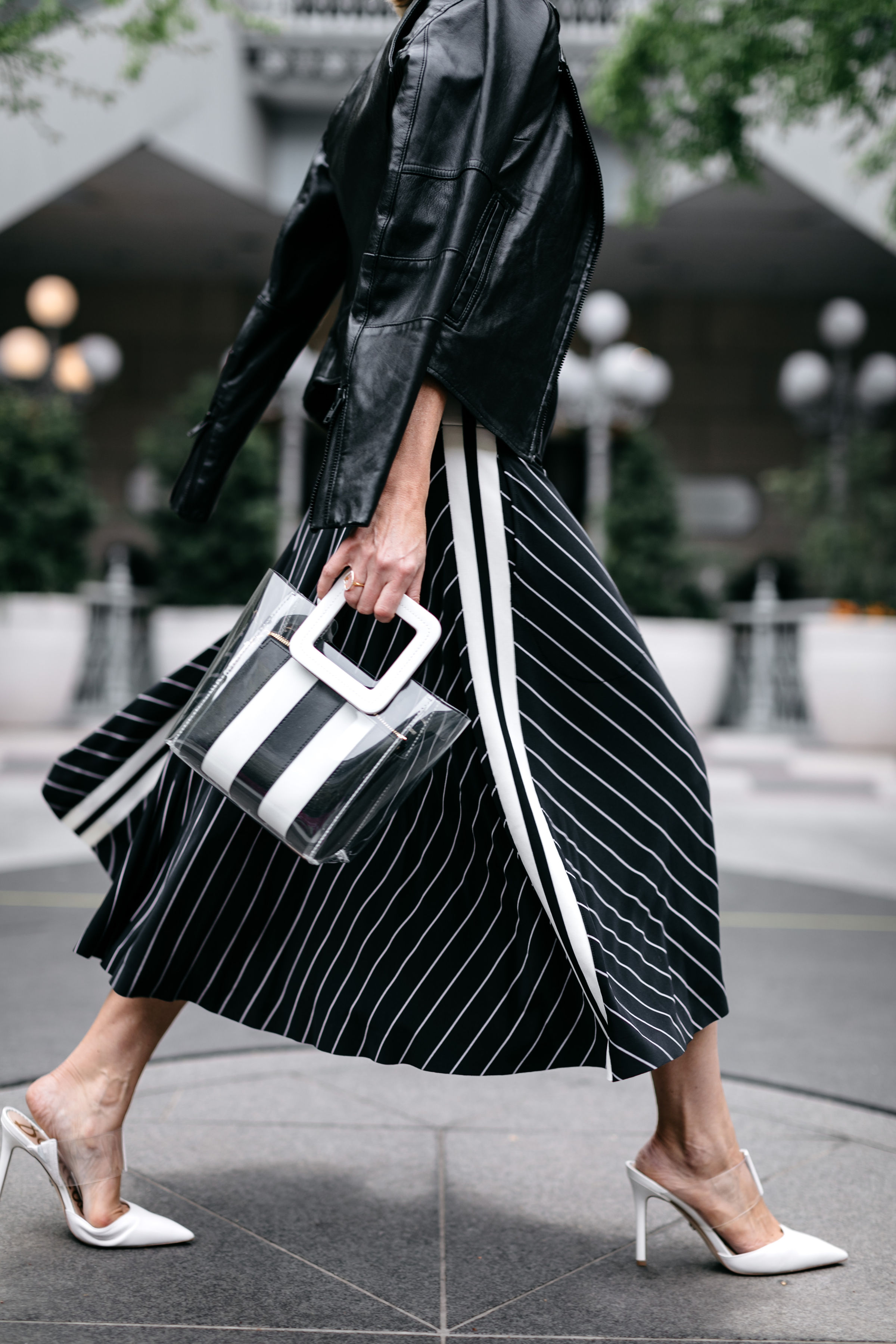 How To Mix Prints, Fashion blogger Erin Busbee of BusbeeStyle.com wearing a striped Norma Kamali skirt, white Sam Edelman Hope Pumps, white LNA tee, black and white striped Staud shirley tote, and Joie black leather jacket in Dallas, Texas at the rewardStyle Conference