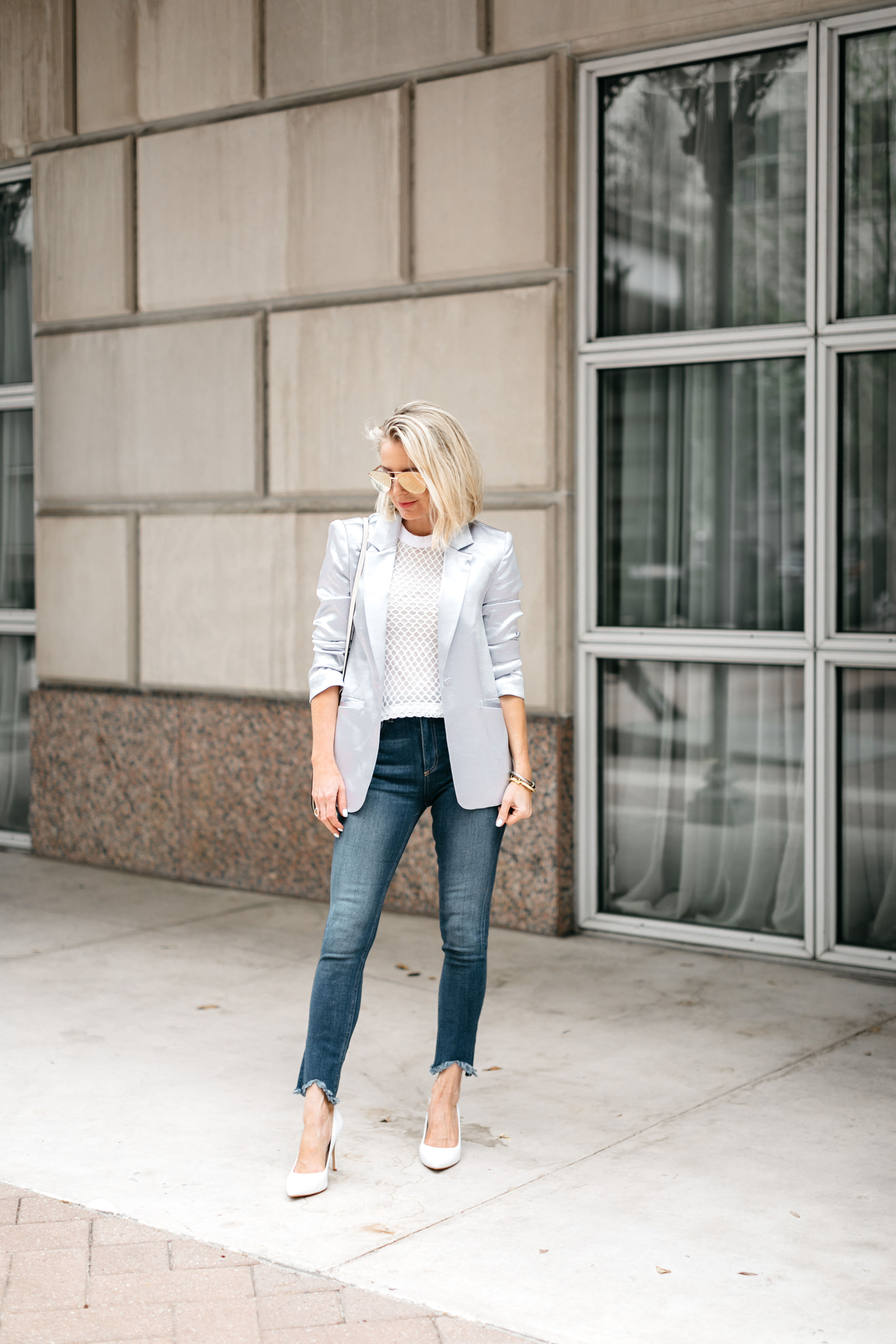 fashion blogger showing how to elevate a casual outfit with white sam edelman hazel leather pumps and cing a sept kylie jacket in mercury at the rewardstyle conference