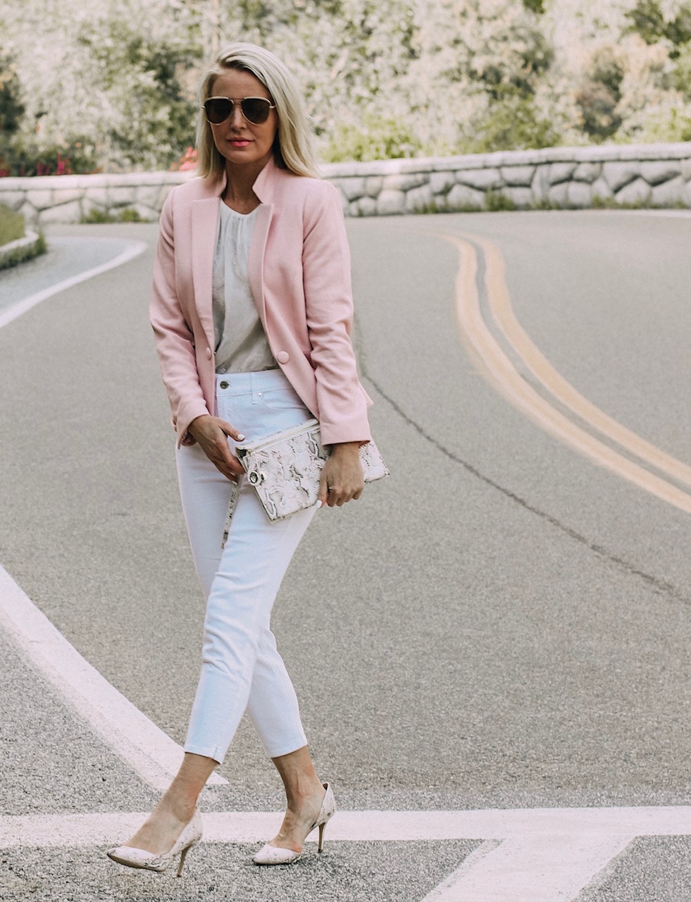 Spring Office Outfits, Fashion blogger Erin Busbee of BusbeeStyle.com wearing a blazer with a snake print shell and white cropped jeans, with pink snake print heels and clutch from White House Black Market in Sequoia National Park