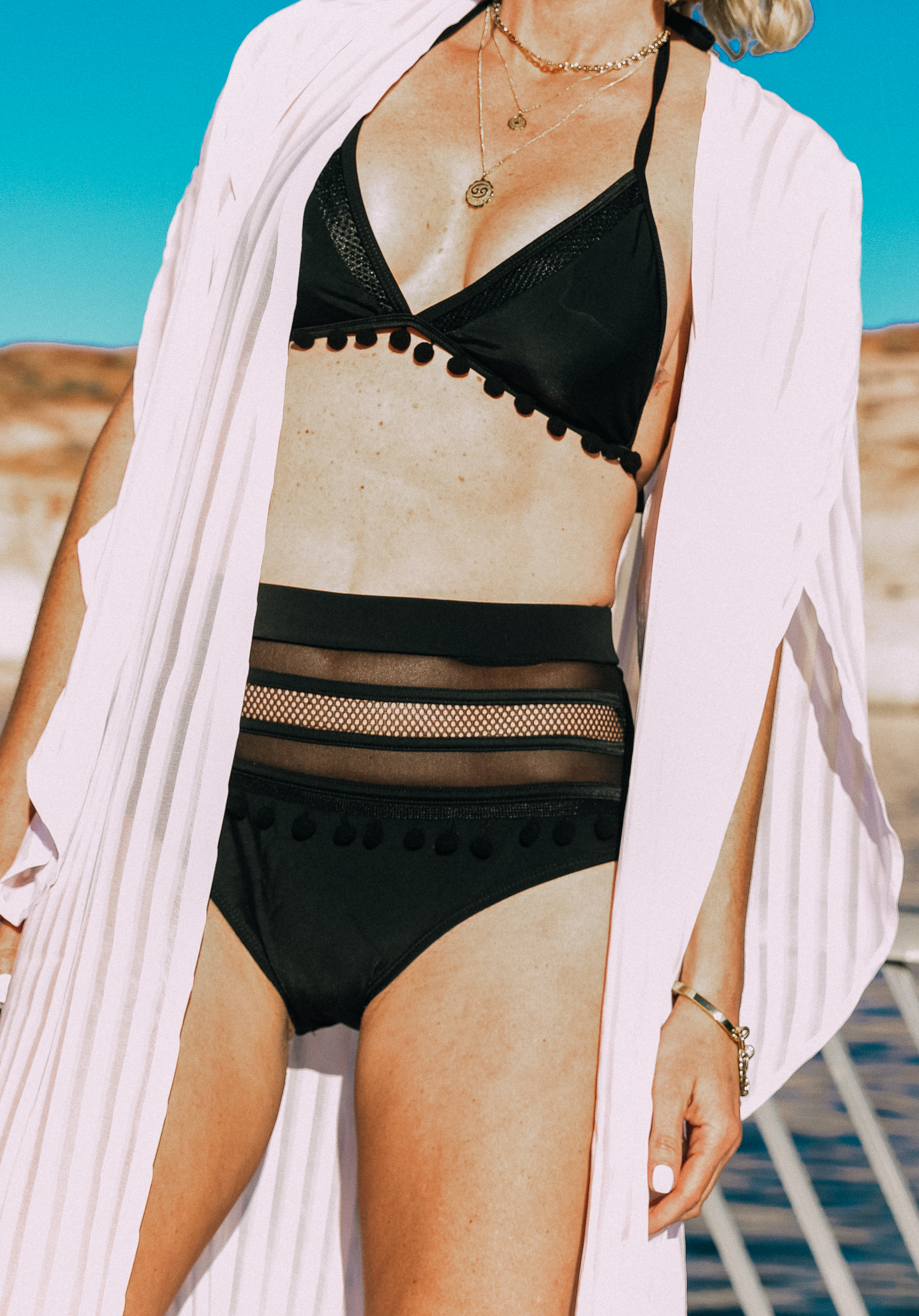 Amazon Find, Fashion blogger Erin Busbee of Busbee Style wearing a black pom pom and mesh high waist bikini from Amazon at Lake Powell with a white coverup and Treasure and Bond wedges