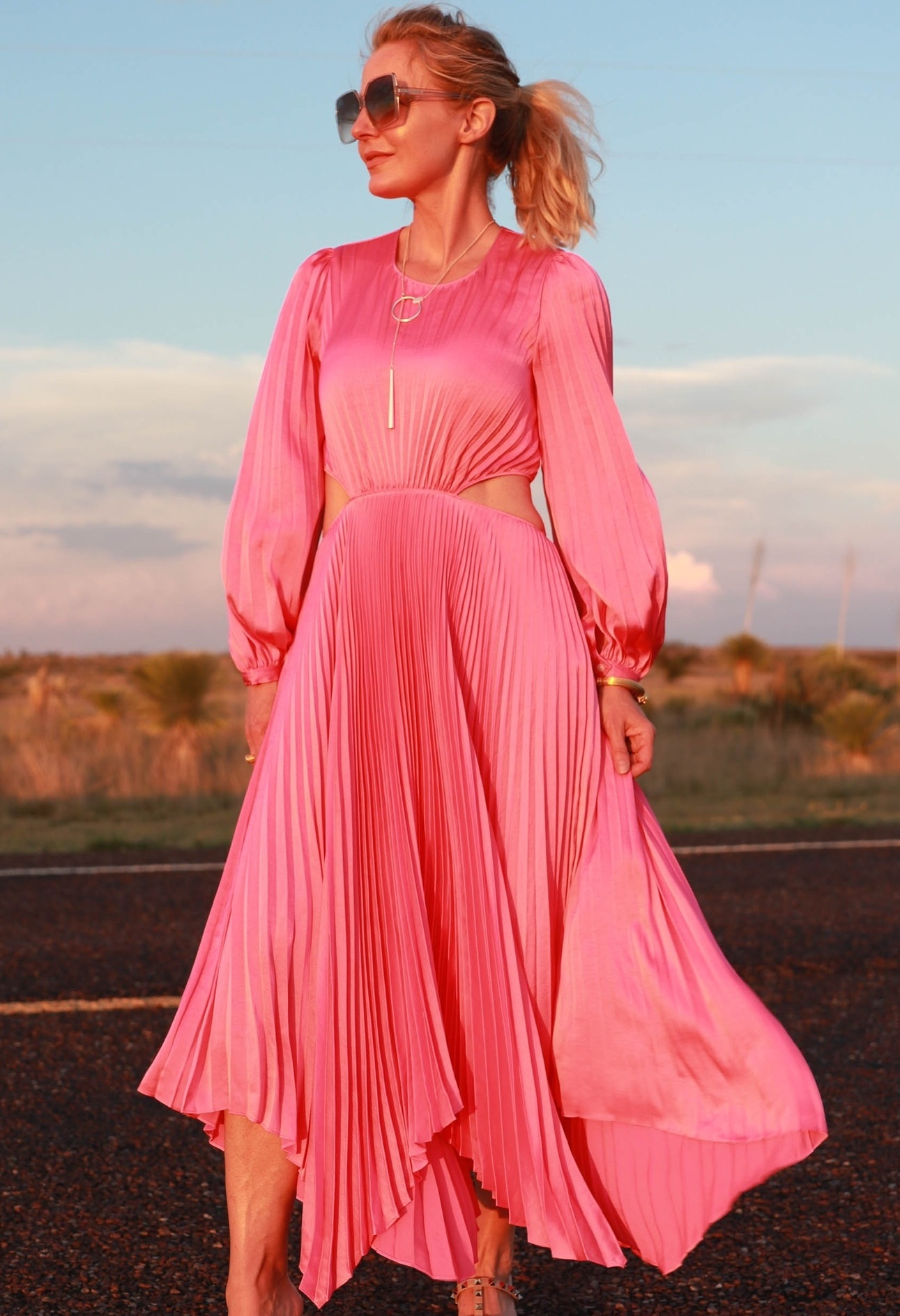 ALC pink pleated dress midi length with cutouts and sleeves on fashion over 40 blogger Erin Busbee