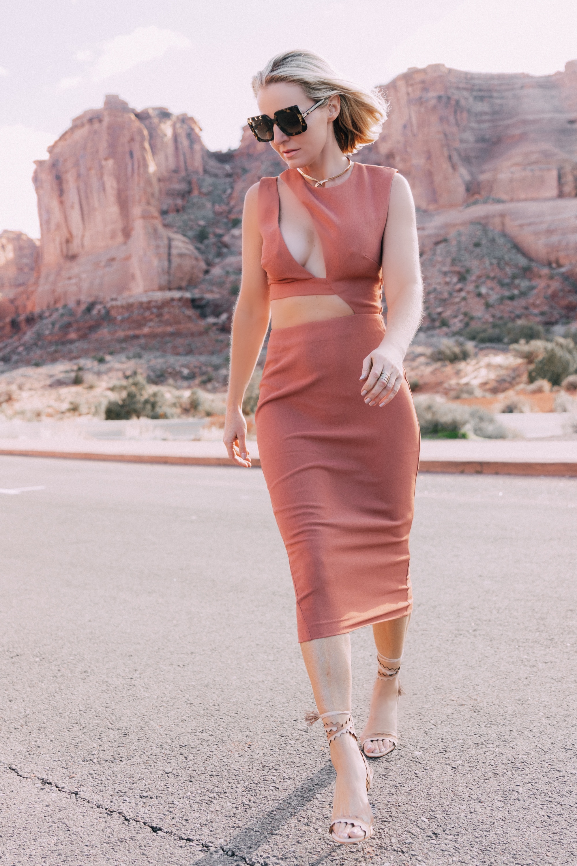 Trendy Rust Colored Midi Dress with Sexy Cutouts on fashion over 40 blogger Erin Busbee in Moab, Utah #3