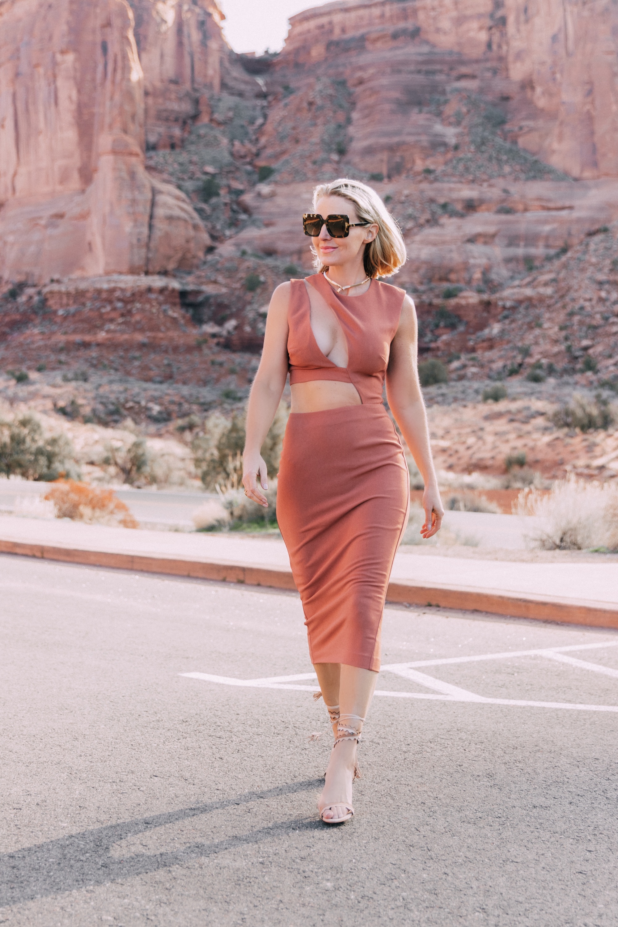 Trendy Rust Colored Midi Dress with Sexy Cutouts on fashion over 40 blogger Erin Busbee in Moab, Utah #3