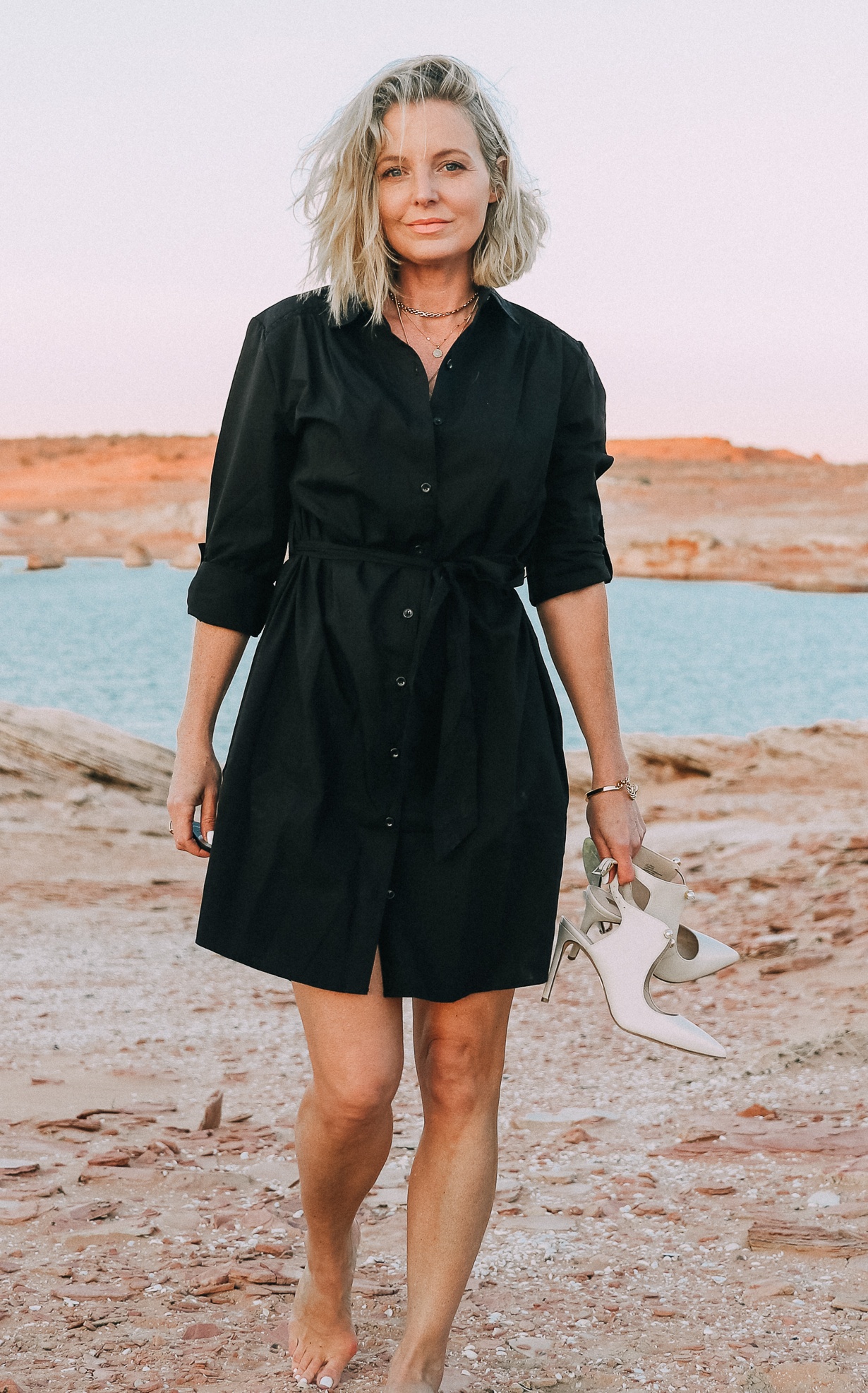 How To Wear A Shirtdress, fashion blogger erin busbee of busbeestyle.com at Lake Powell, Arizona wearing a black Time and Tru shirtdress from Walmart with Louise et Cie white pumps