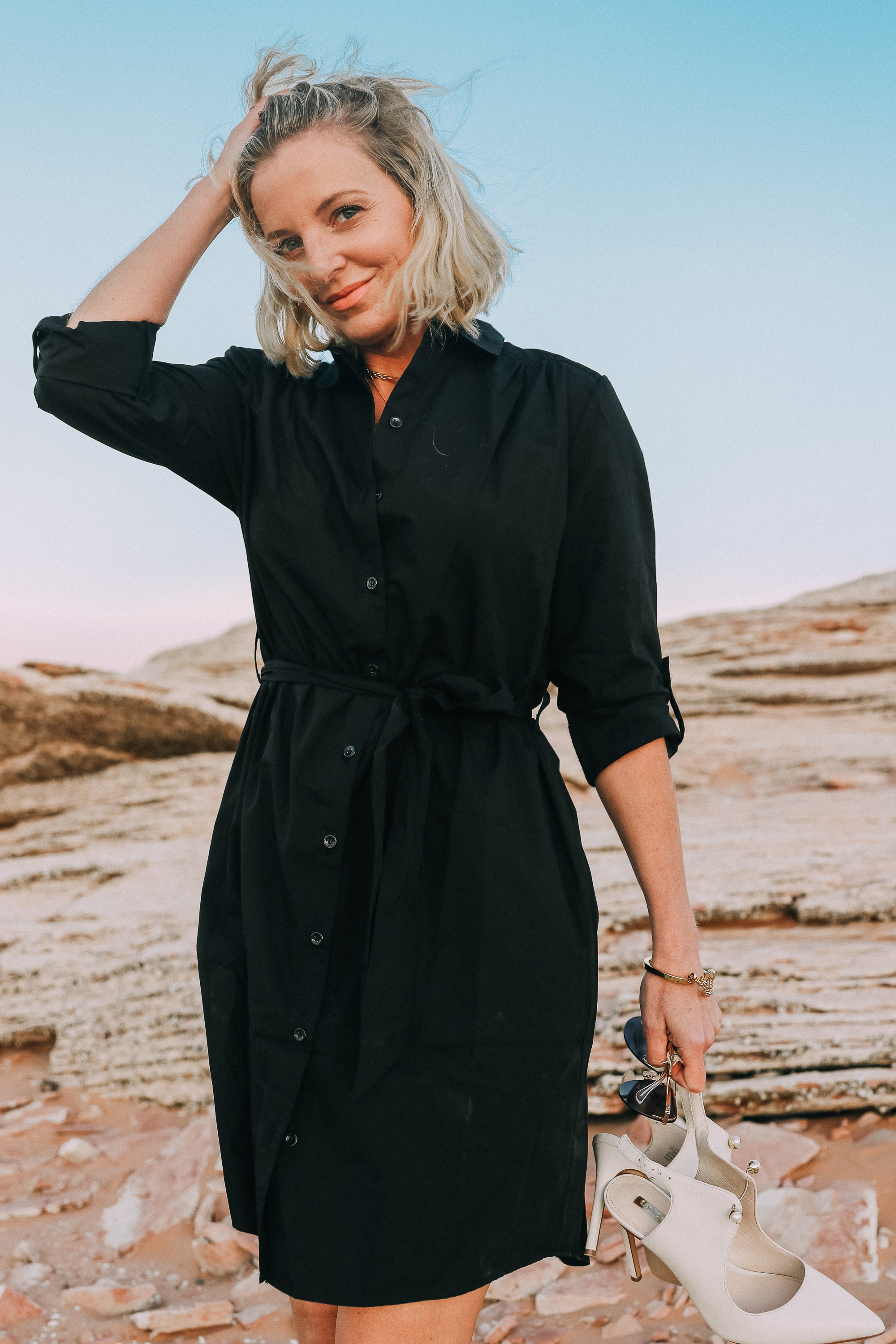 How To Wear A Shirtdress, fashion blogger erin busbee of busbeestyle.com at Lake Powell, Arizona wearing a black Time and Tru shirtdress from Walmart with Louise et Cie white pumps