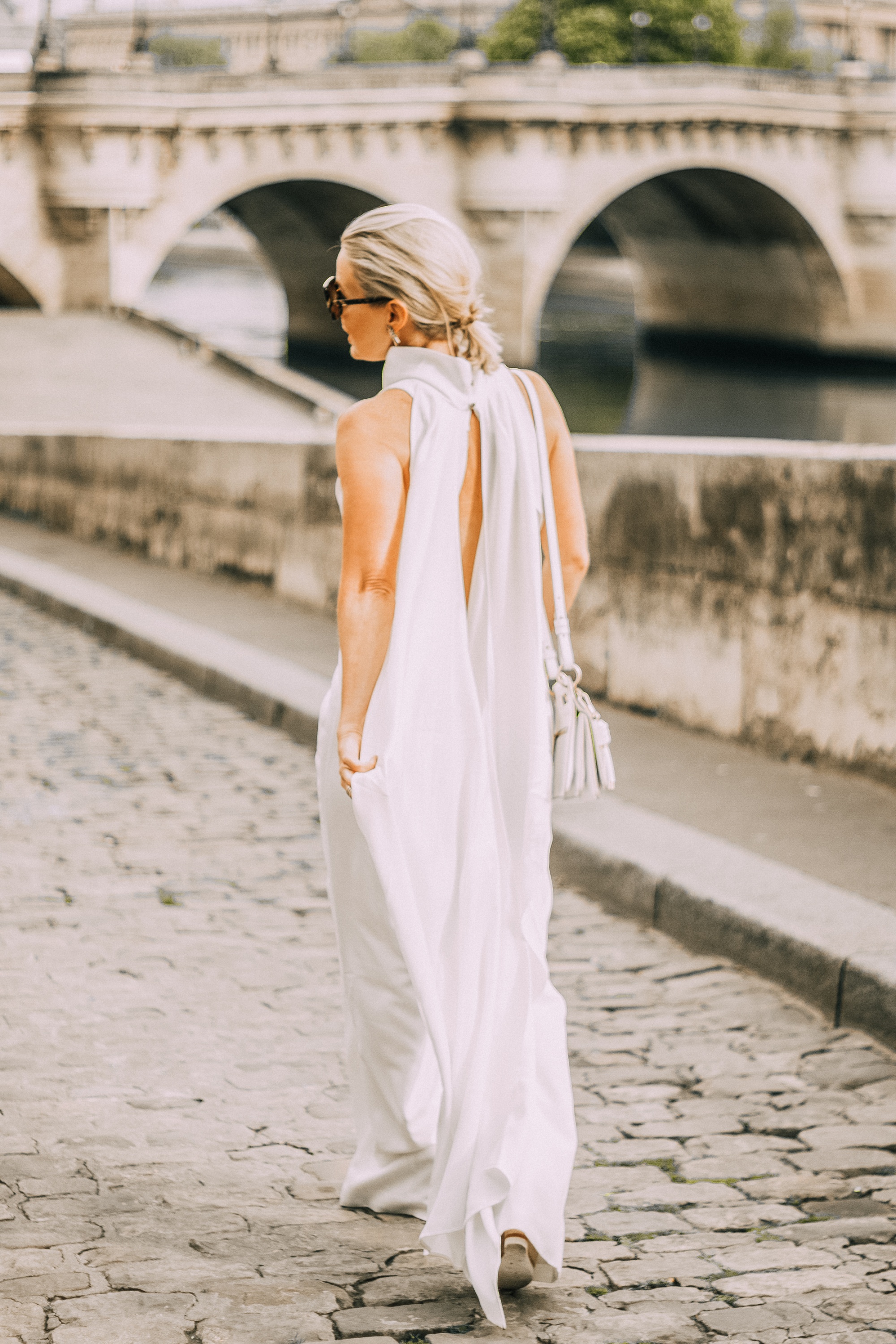 white wide leg misha collection jumpsuit with crisscross back