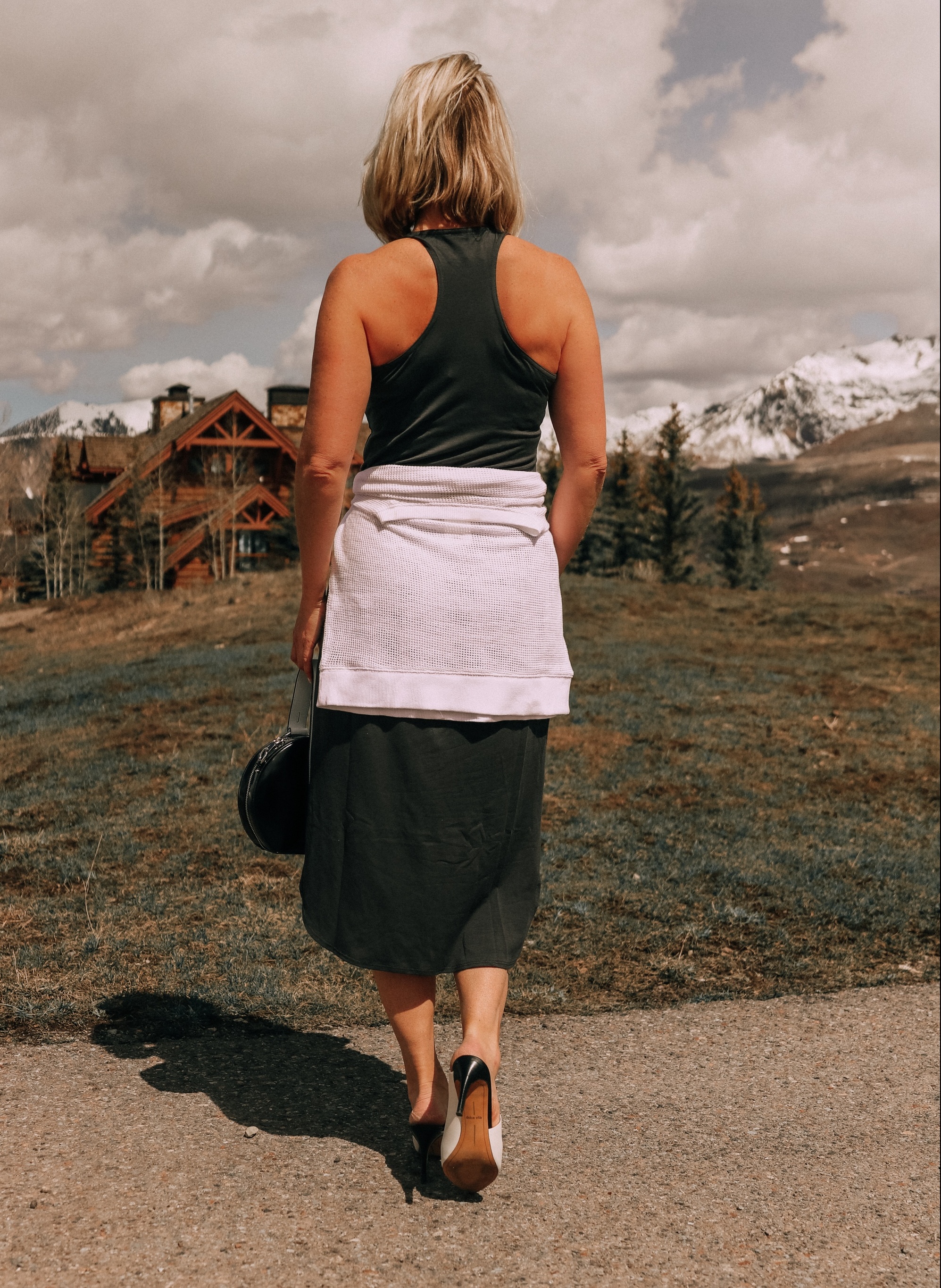 back of eileen fisher racerback midi tank dress with raglan sweater tied around waist