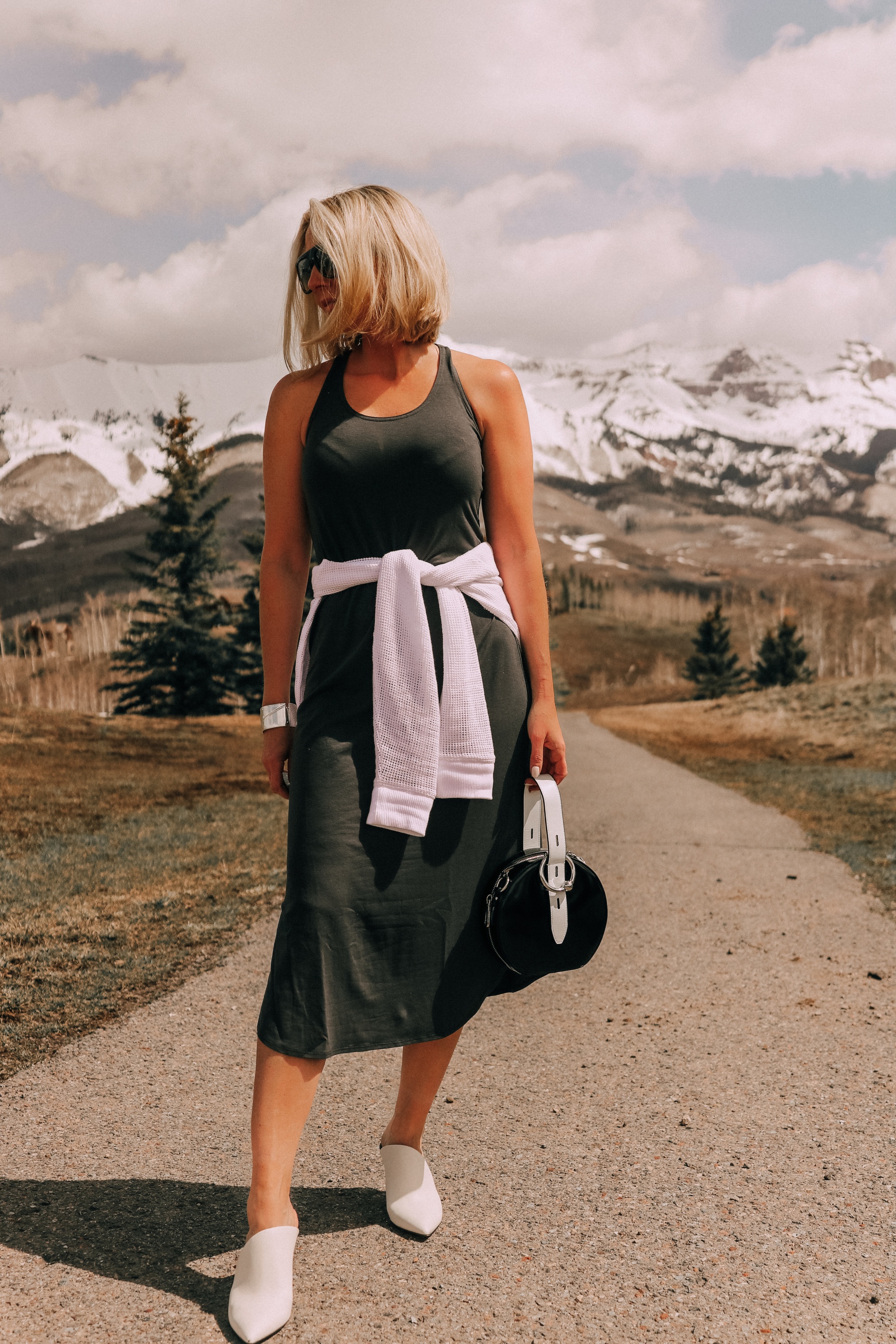 eileen fisher midi tank dress paired with dolce vita camala high-heel mules carrying rebecca minkoff kate colorblock circle bag