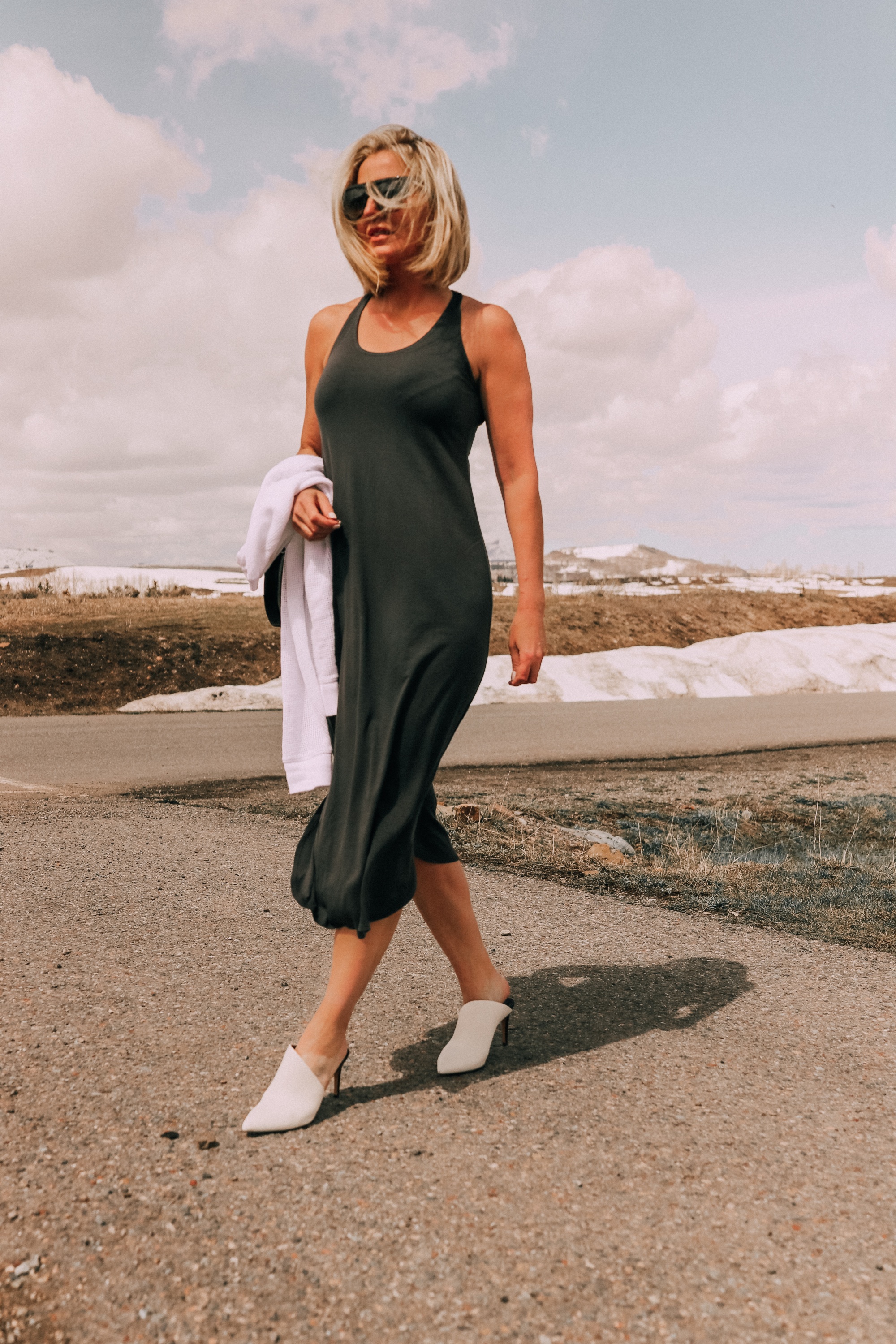 eileen fisher midi tank dress paired with dolce vita camala high-heel mules carrying eileen fisher raglan sweater