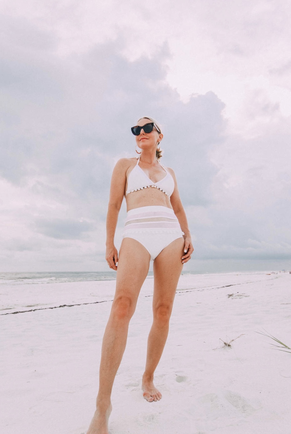 Best Swimsuit for Summer from Amazon that's ONLY $25, Fashion blogger Erin Busbee of BusbeeStyle.com wearing a striped button down by Rails with a white swimsuit from Amazon on the beach in Florida