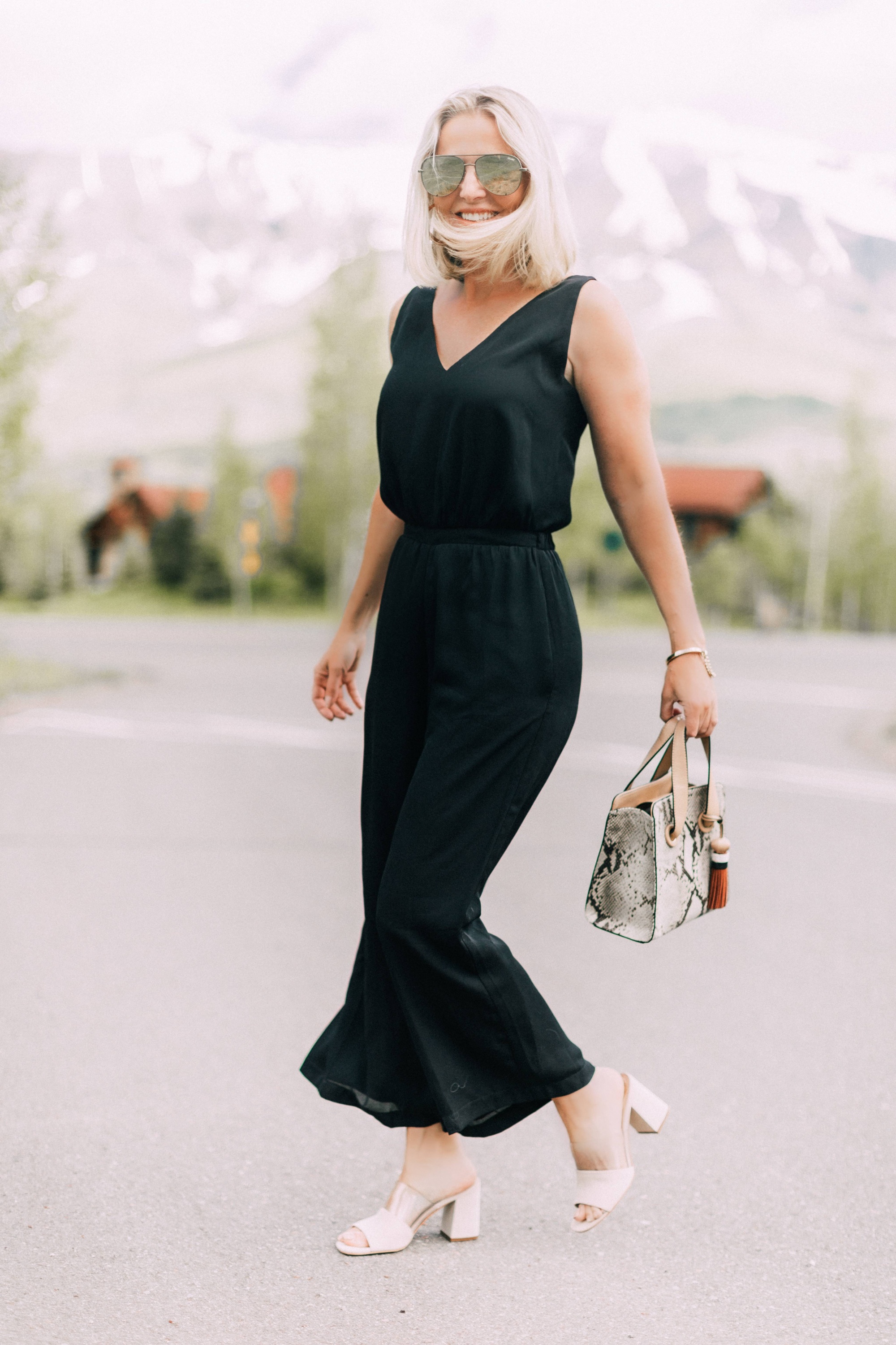 Lucite Trend, Fashion blogger Erin Busbee of BusbeeStyle.com wearing lucite mules from Vince Camuto with J Brand jeans, white Leith top, Hermes belt, and a python print Vince Camuto bag in Telluride, Colorado