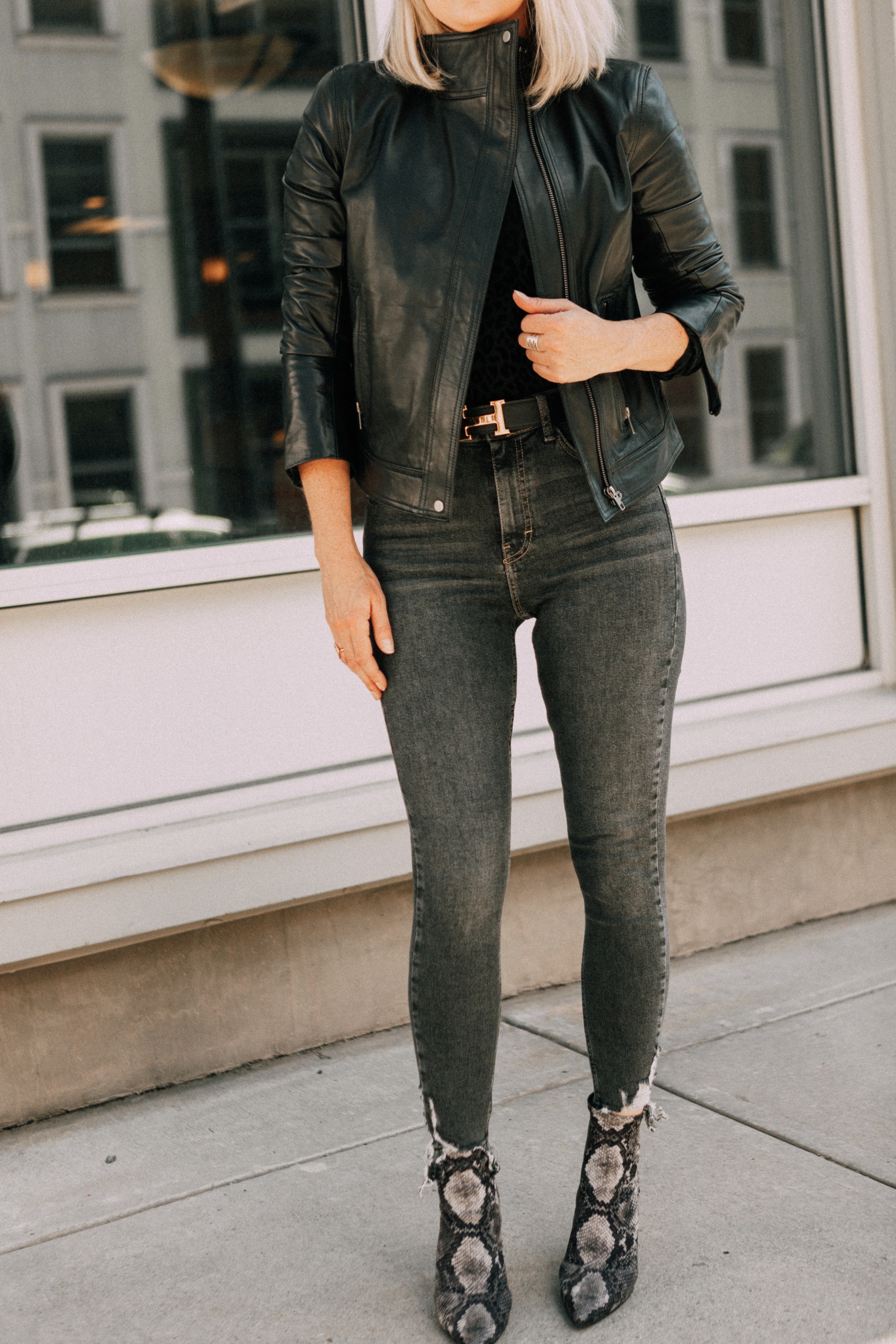 Leather Moto Jacket, Fashion blogger over 40 Erin Busbee of BusbeeStyle.com featuring the Chelsea28 black leather jacket from the Nordstrom Anniversary Sale 2019 styled with the velvet leopard bodysuit, Topshop jeans, and Charles Davidson python print booties from Nordstrom in Telluride, Colorado