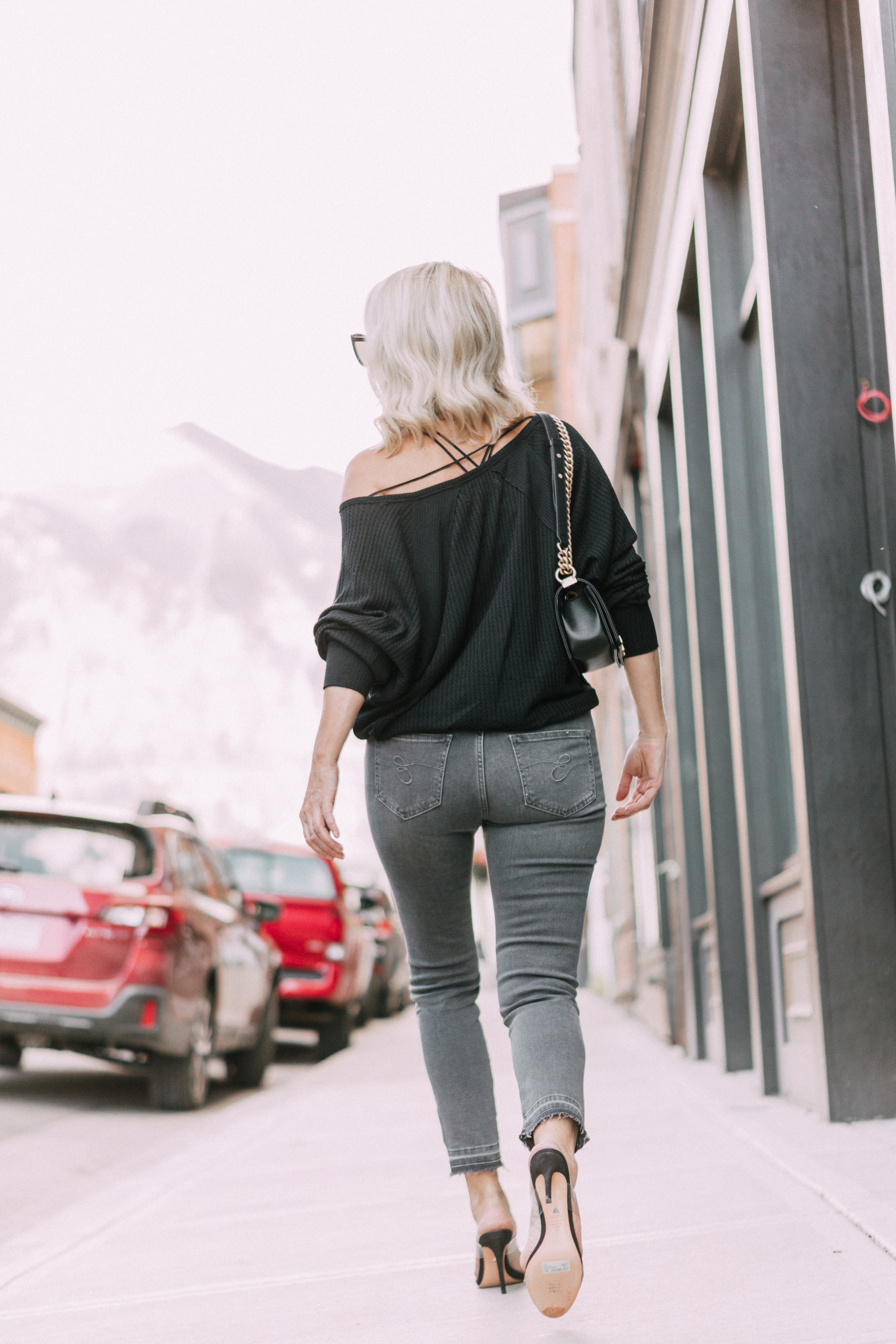 Striped Jeans, Fashion blogger Erin Busbee of BusbeeStyle.com wearing black patent striped jeans by Escada, waffle knit tee by Free People, bralette by Free People, heels by Schutz, and Chanel bag from Bloomingdale's in Telluride, CO