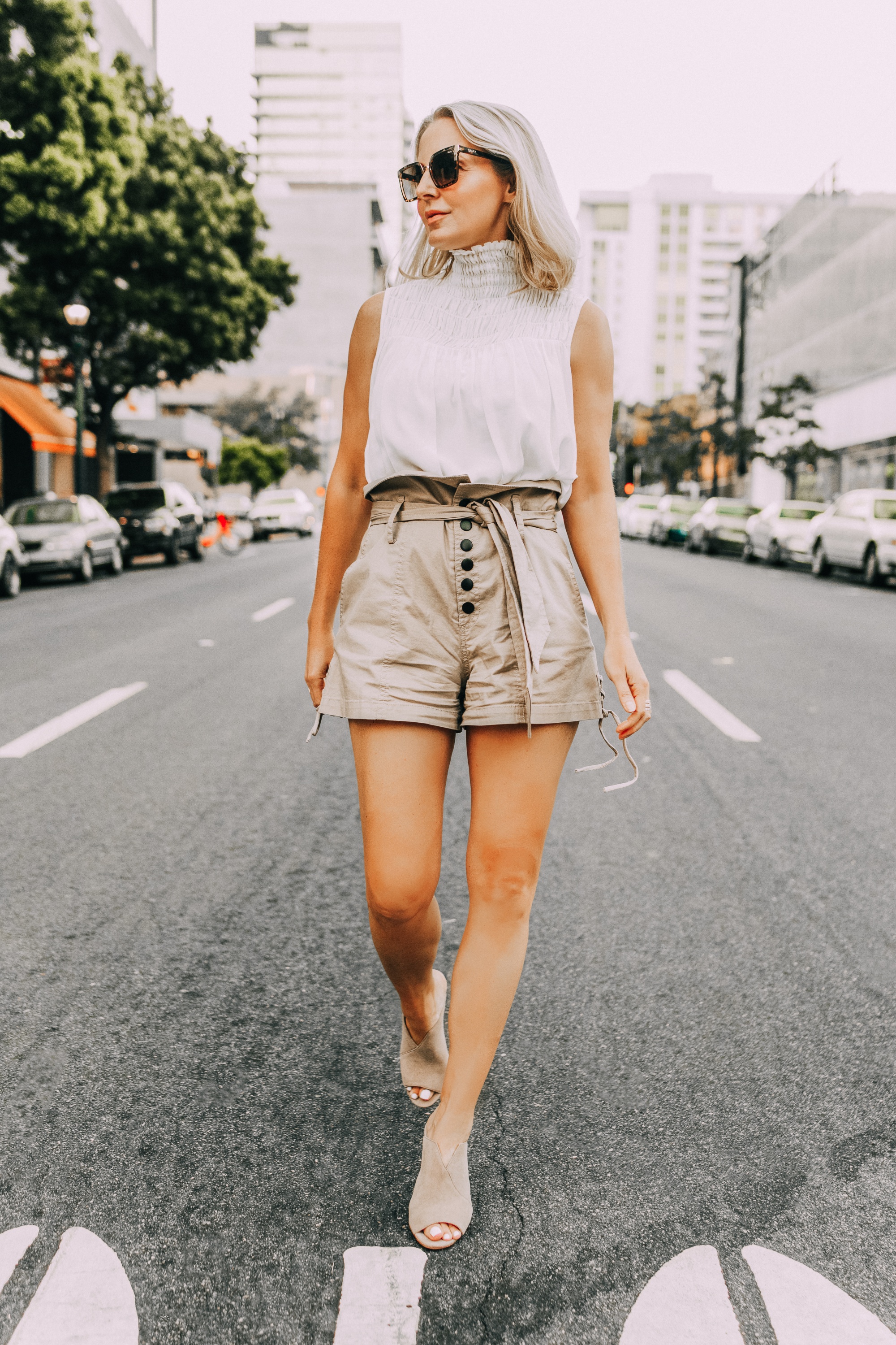 Paper bag shorts, fashion blogger Erin Busbee of BusbeeStyle.com wearing paper bag shorts by Marissa Webb with a white Frame sleeveless high neck top and Vince Camuto peep toe mules in San Diego, CA
