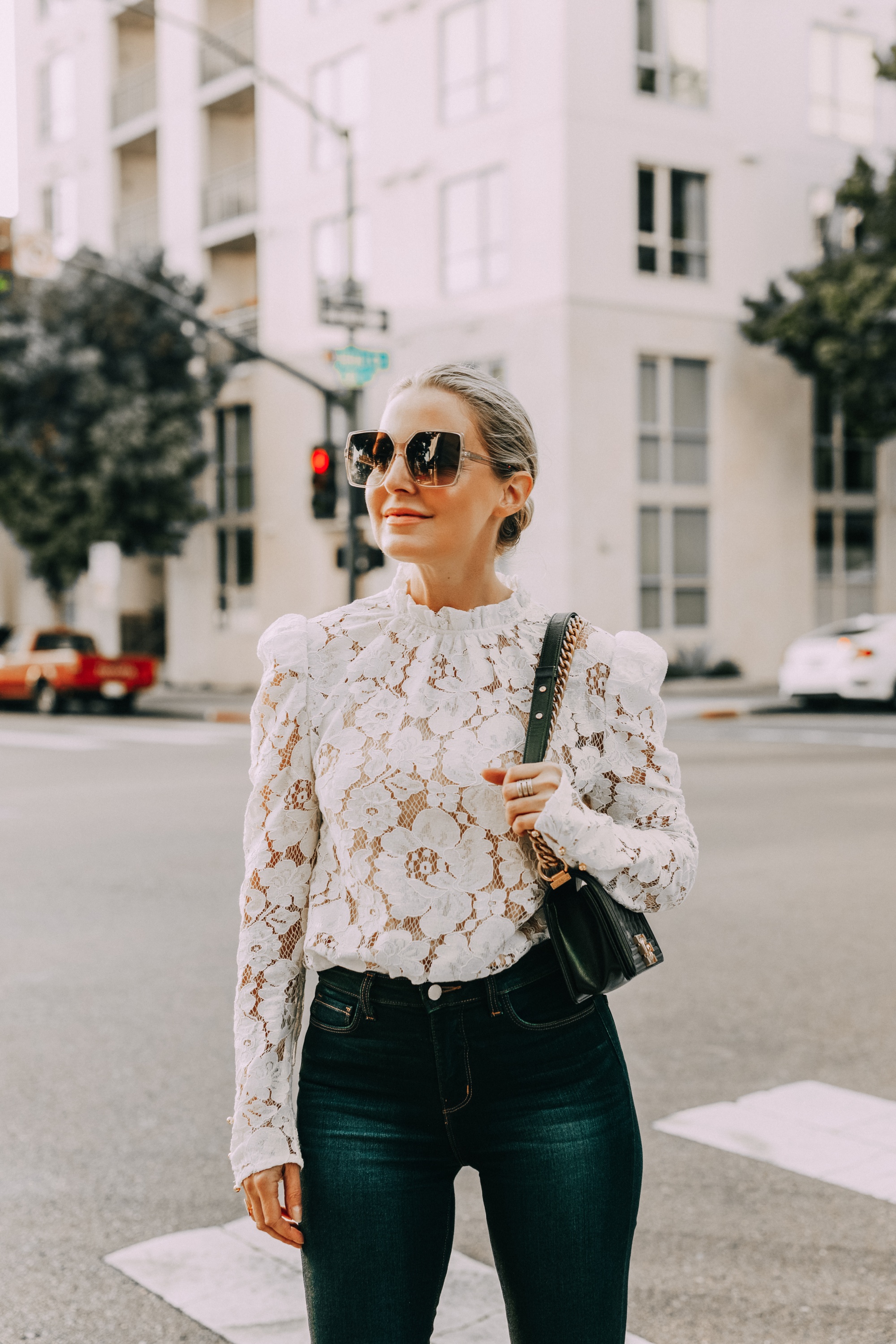 white lace Wayf blouse with blue jeans fashion blogger outfit