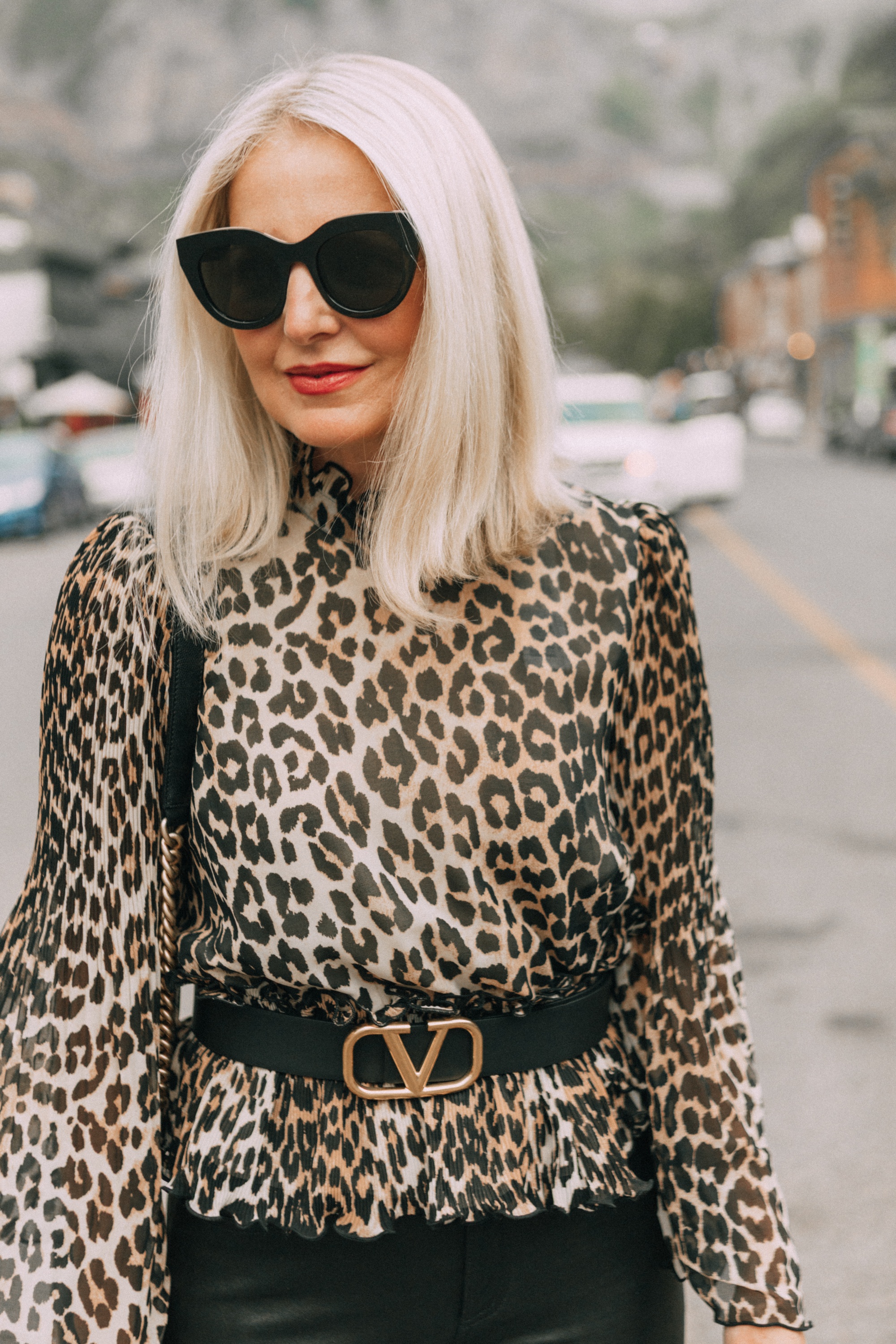 accessory basics like a reversible belt are a must have! featuring the Valentino belt with a Ganni leopard print blouse