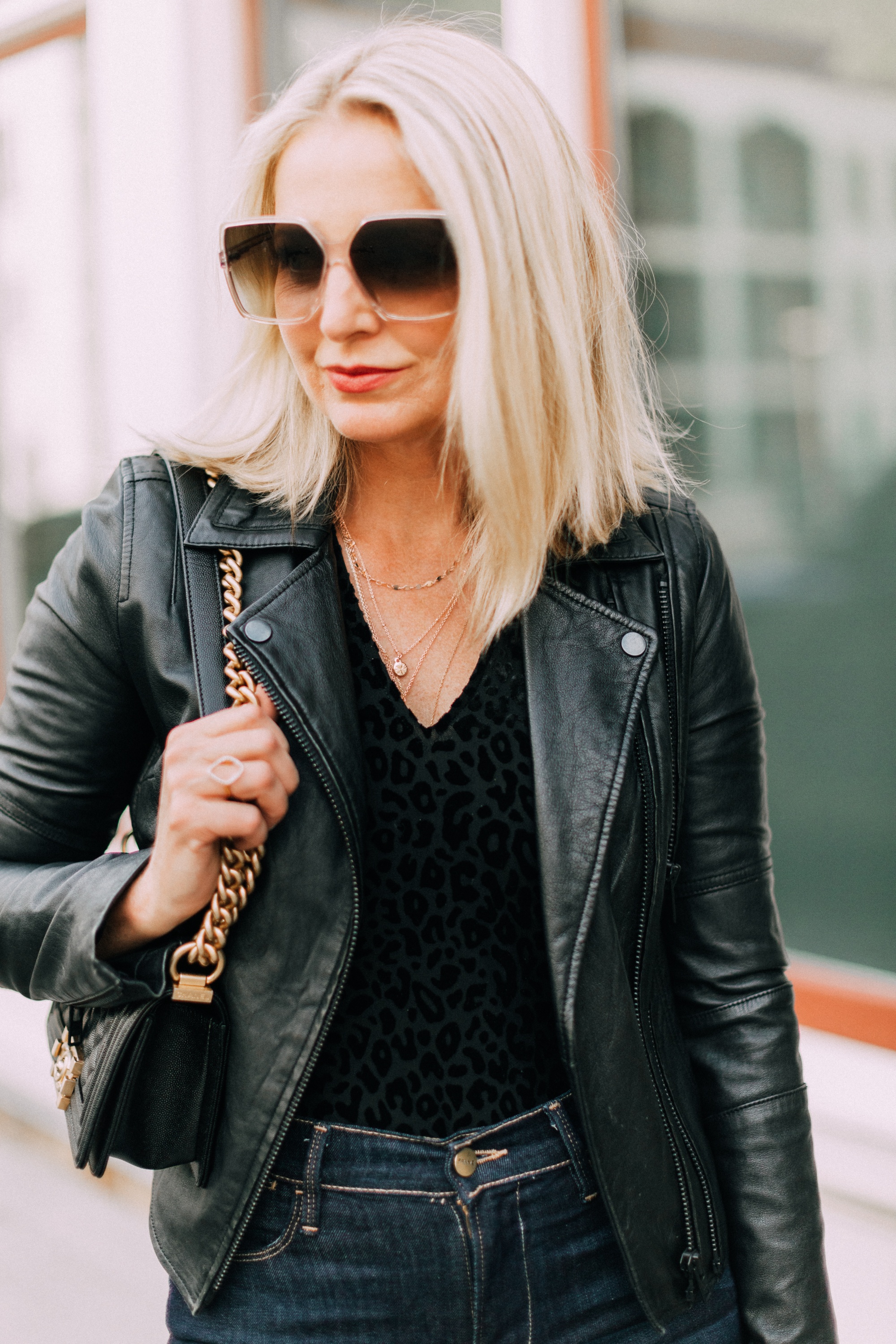 Leather jacket on fashion blogger Erin Busbee of Busbee style in Telluride Colorado