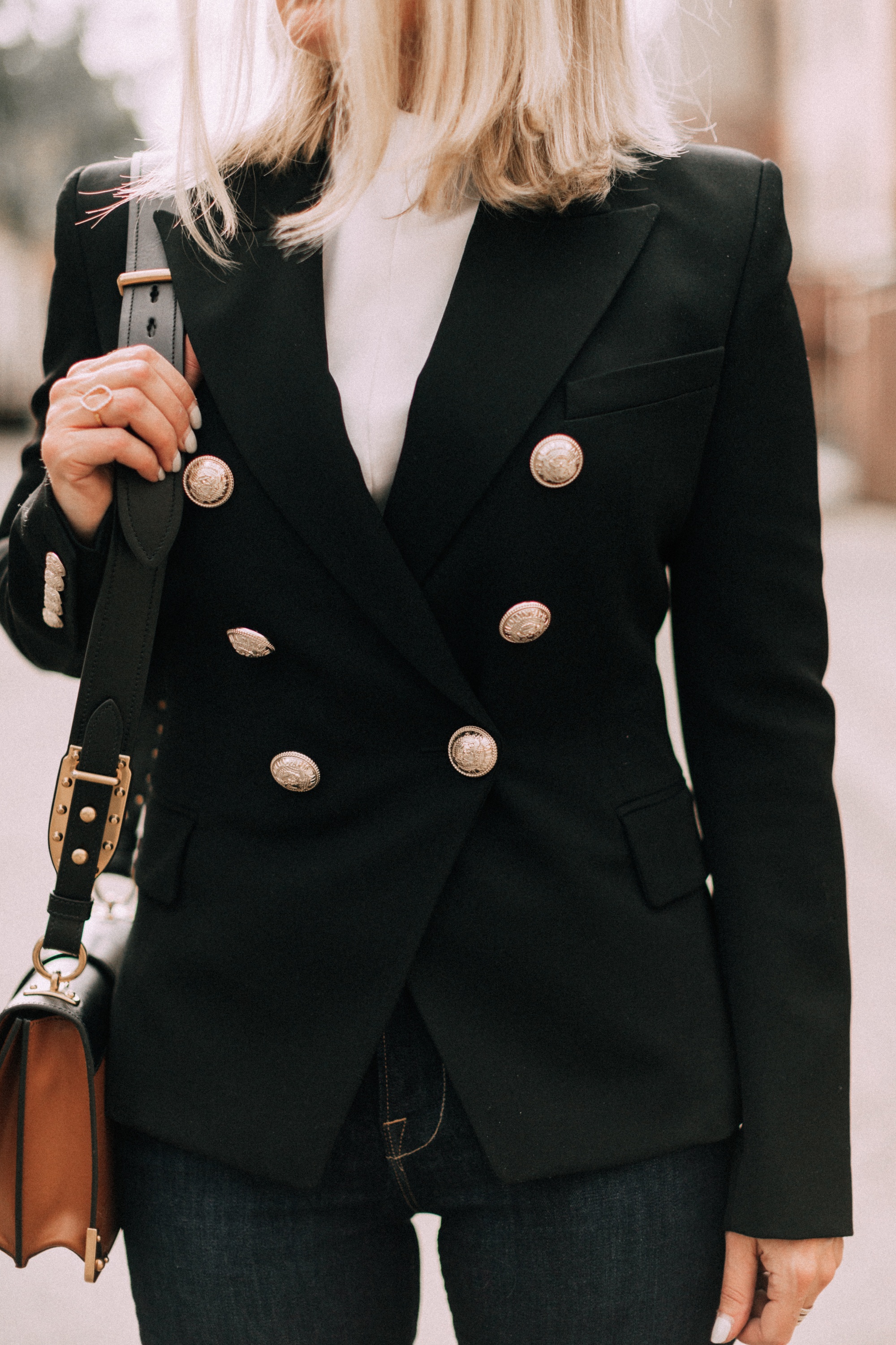 black Balmain blazer with gold buttons worn with Prada cahier crossbody handbag outfit