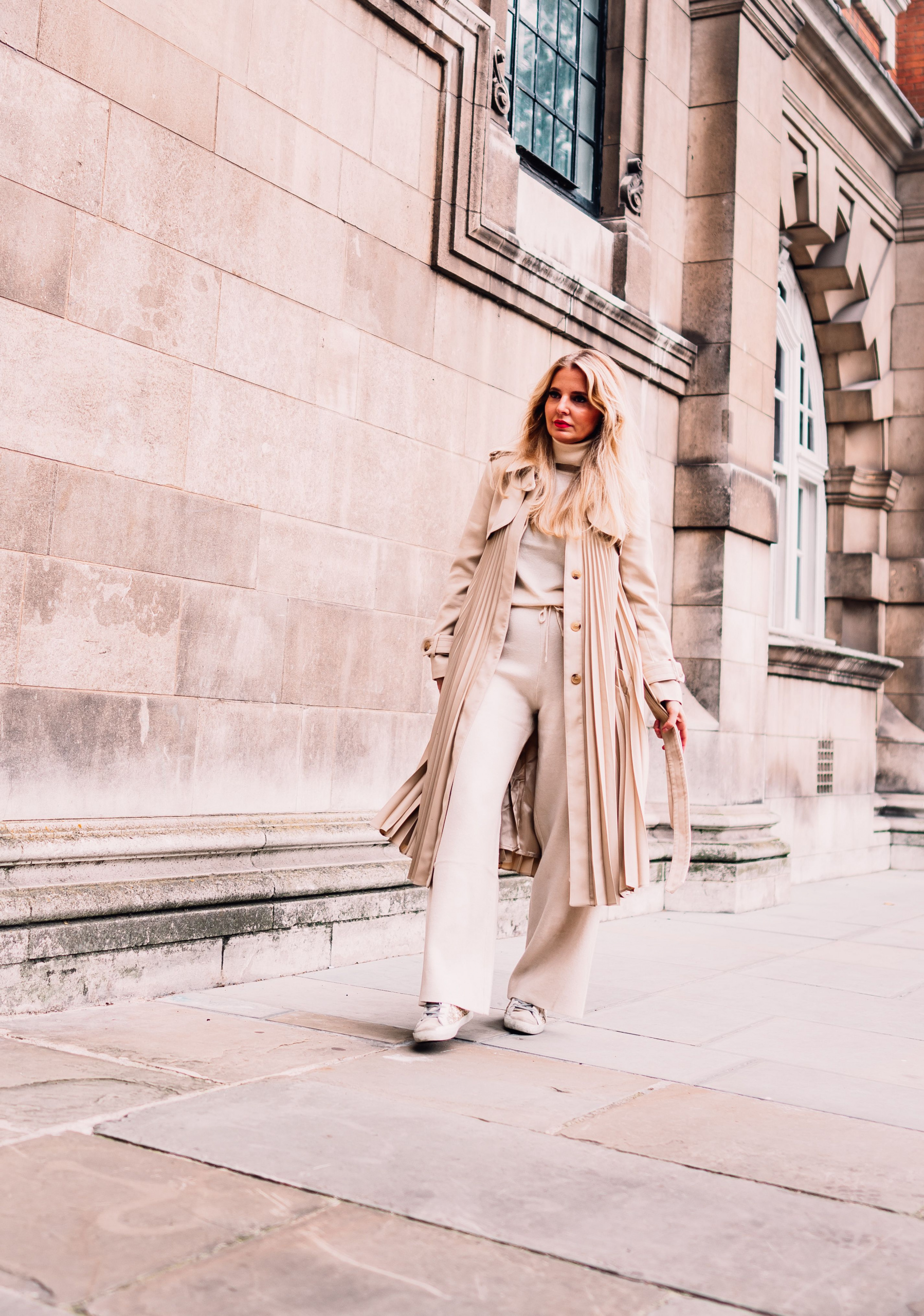 Sandro trench, why a chic trench coat belongs in every woman's closet, wardrobe basics, trench coats women over 40, trench coat outfits, erin busbee